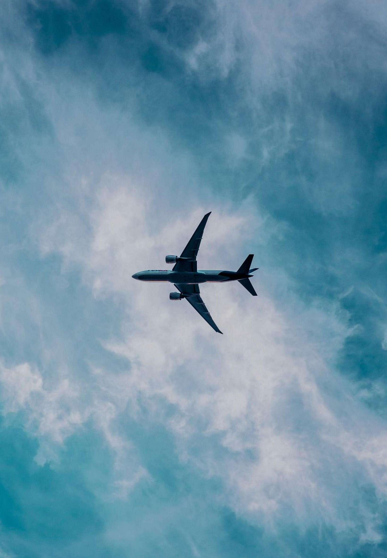 A plane flying in the sky on its way to land - Airplane