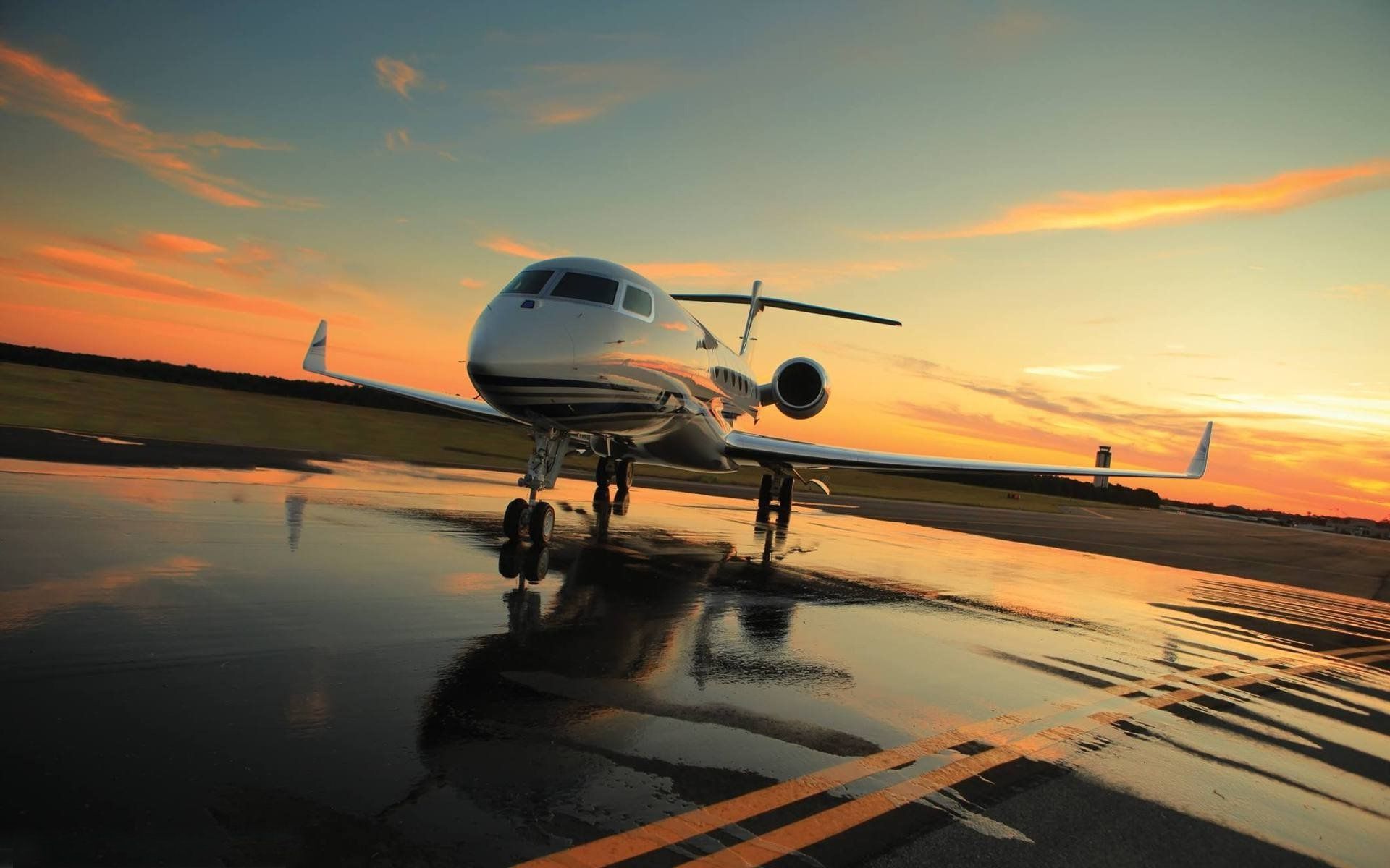 A small airplane sitting on the runway - Airplane