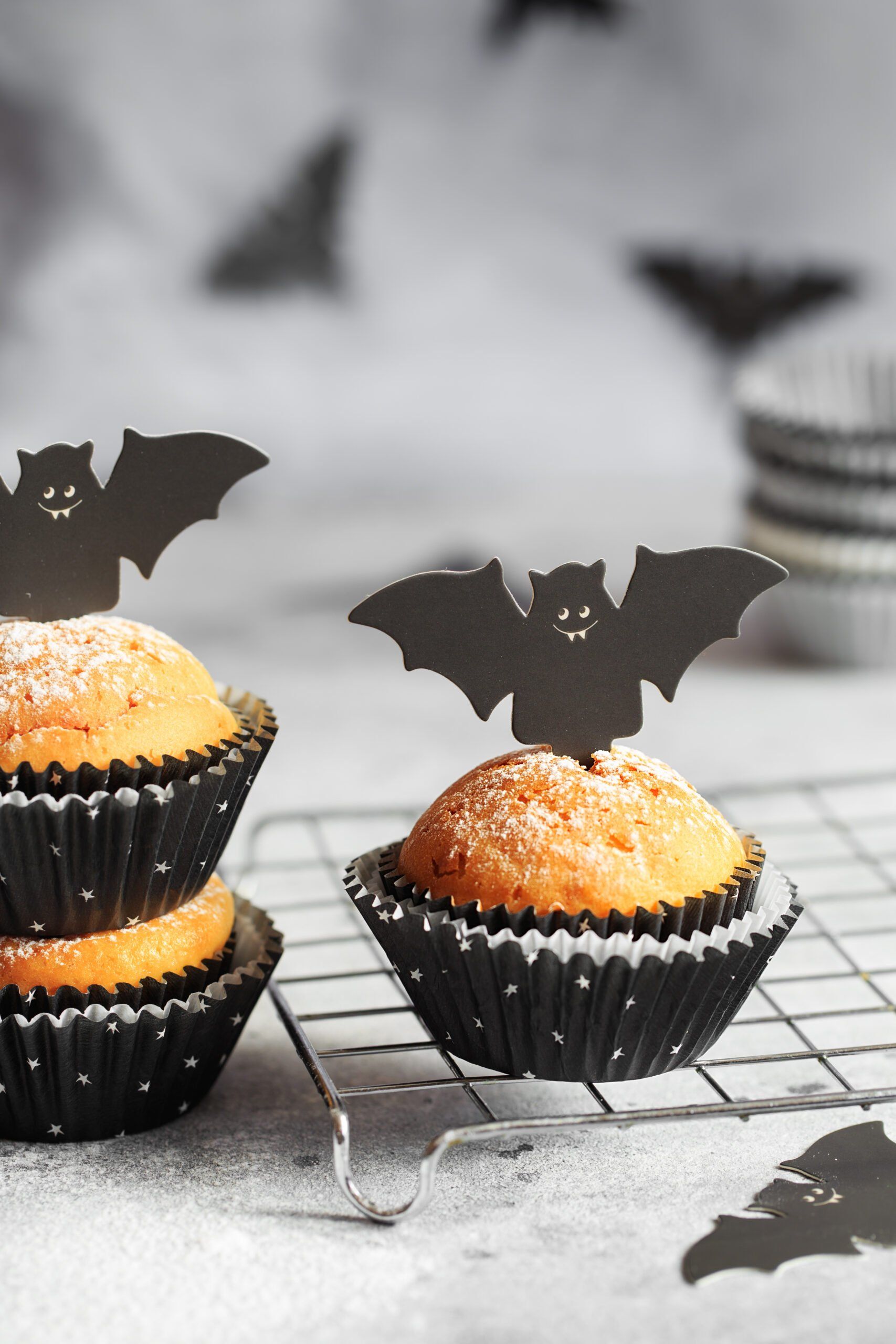 A cupcake with bats on top of it - 