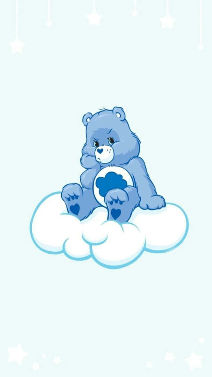 A cute blue teddy bear sitting on top of the cloud - Care Bears