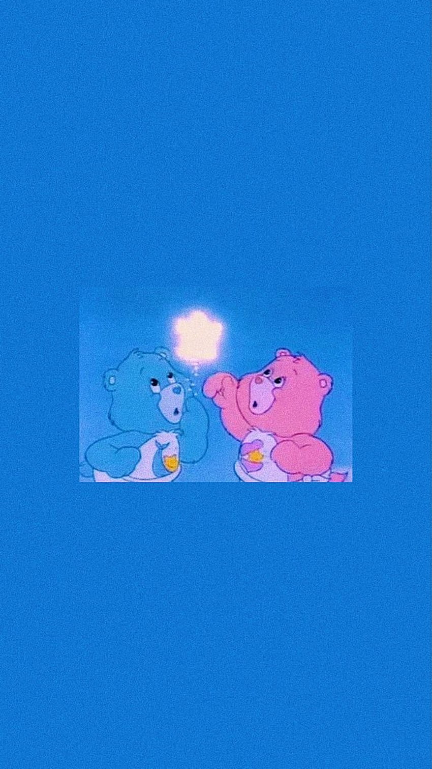 , the image features two lovable Care Bears in close proximity. One Care Bear appears to be a bit larger than the other, and they are both located near each other on a blue background. Both bears are oriented in an open-handed gesture, potentially sharing a moment of affection or bonding together. - Care Bears