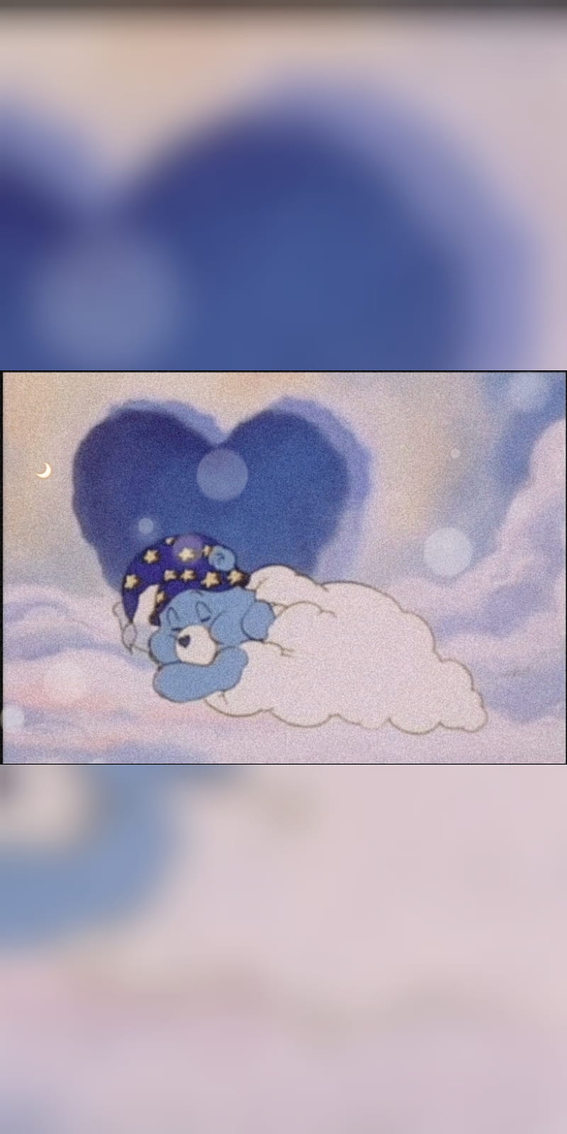 , the image features a cute blue stuffed giraffe sleeping in the clouds. The giraffe is positioned somewhat towards the bottom of the image, with its head slightly closer to the left side of the frame. There are several other smaller objects scattered around the giraffe, such as small blue objects and  - Care Bears