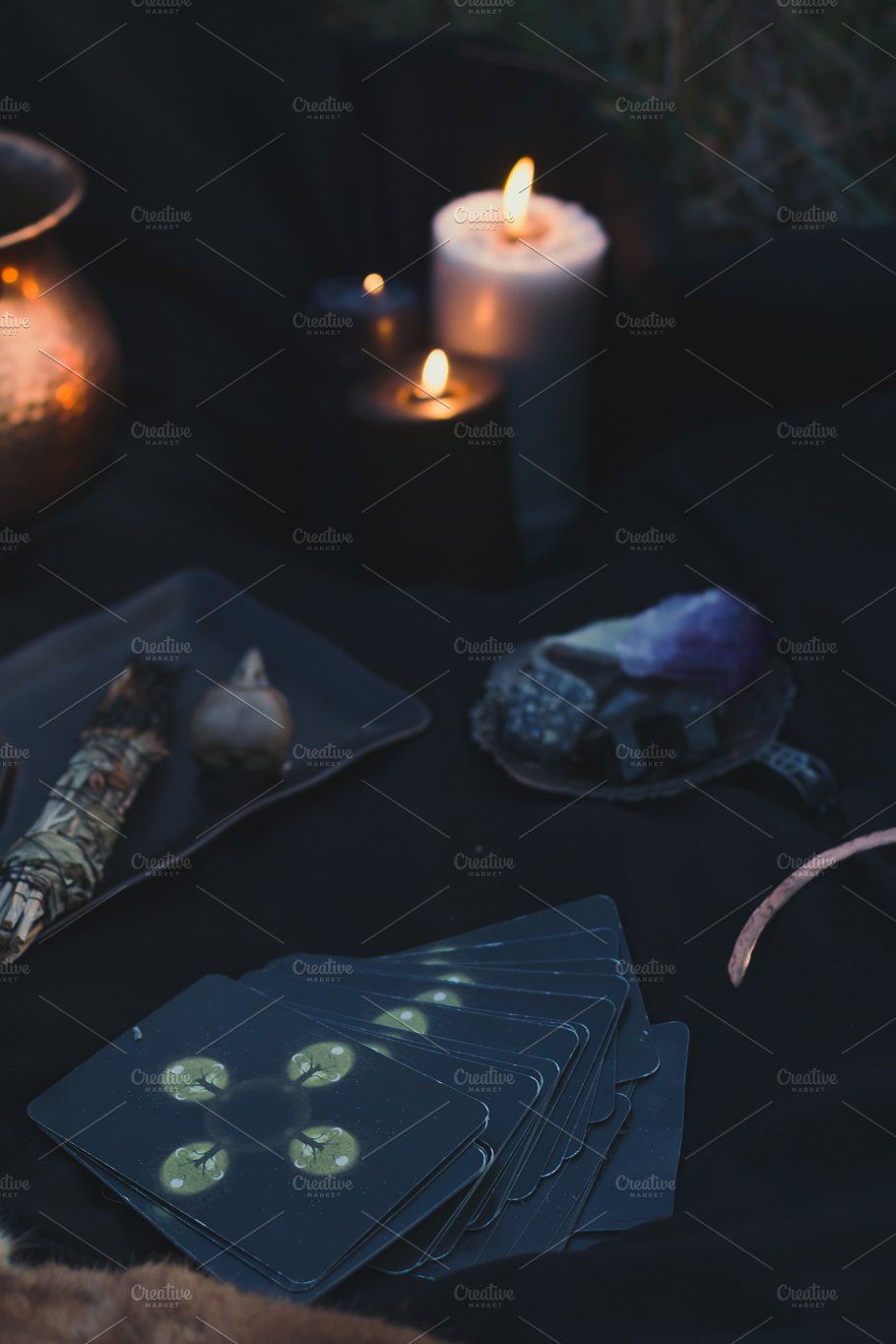 A table with candles and tarot cards - Witchcore