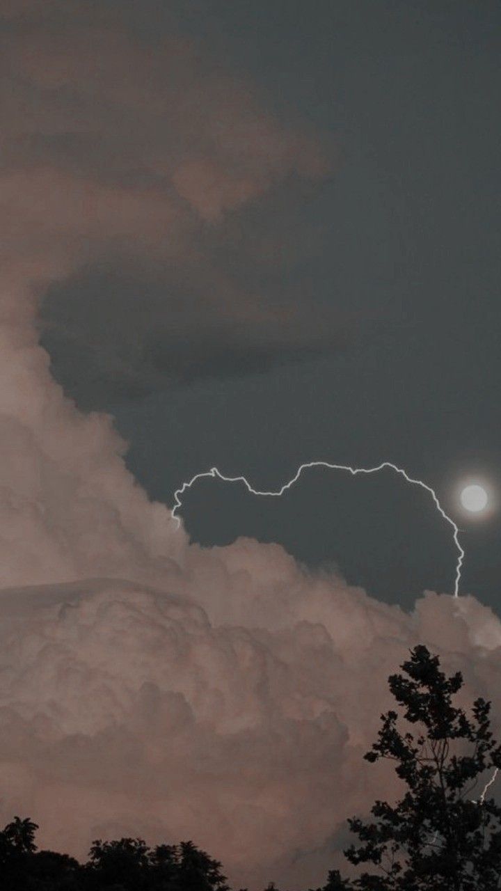 A lightning bolt strikes the sky during an electrical storm - Storm