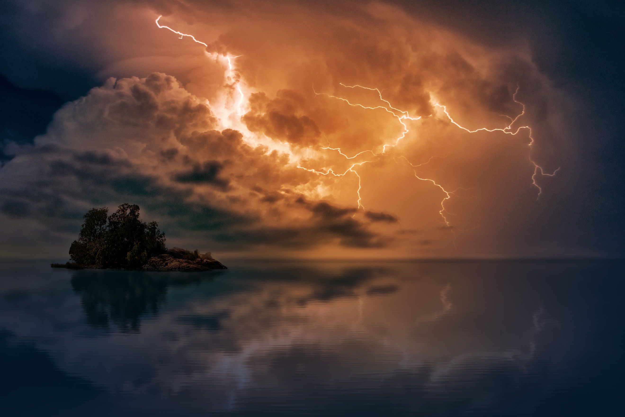 A stormy sky over the ocean with lightning - Storm
