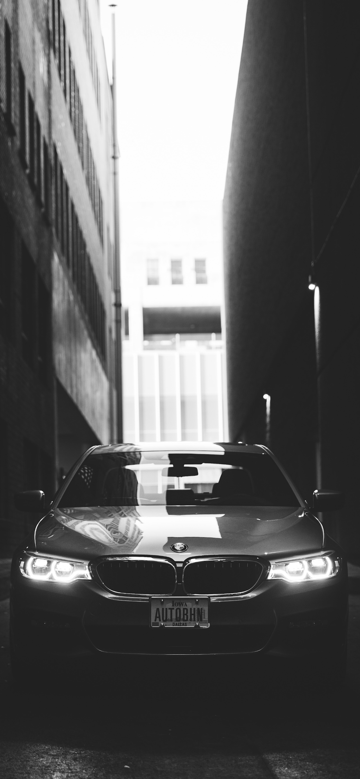 A black and white photo of an automobile - Cars