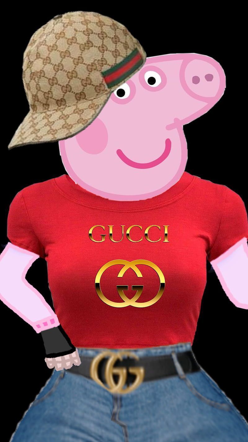 , the image features a pig with a cartoon appearance, dressed in a red shirt and wearing a hat with a pink stripe. The pig has a big smile on its face, which contributes to its friendly demeanor. The pig is taking a stand, making a pose, and wearing a hat with  - Peppa Pig