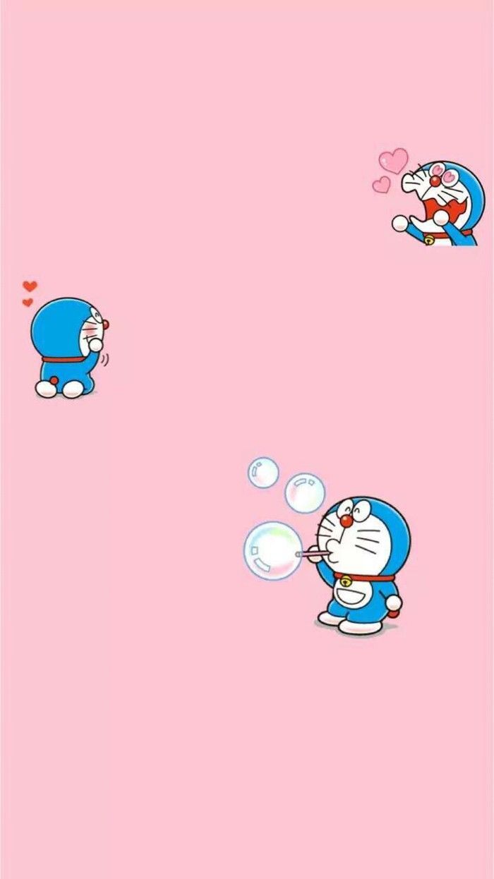 Pink background with a cartoon cat blowing bubbles - Doraemon