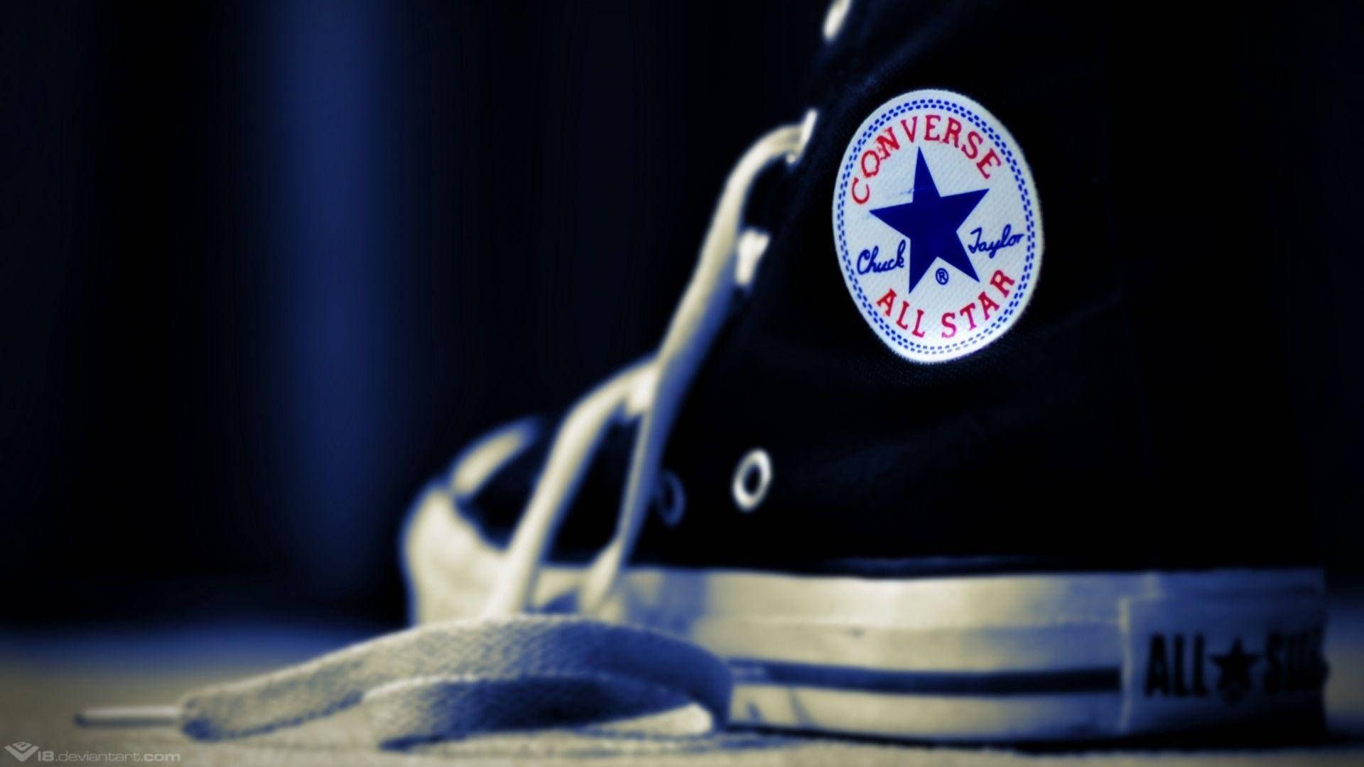 A close up of the bottom part on some shoes - Converse