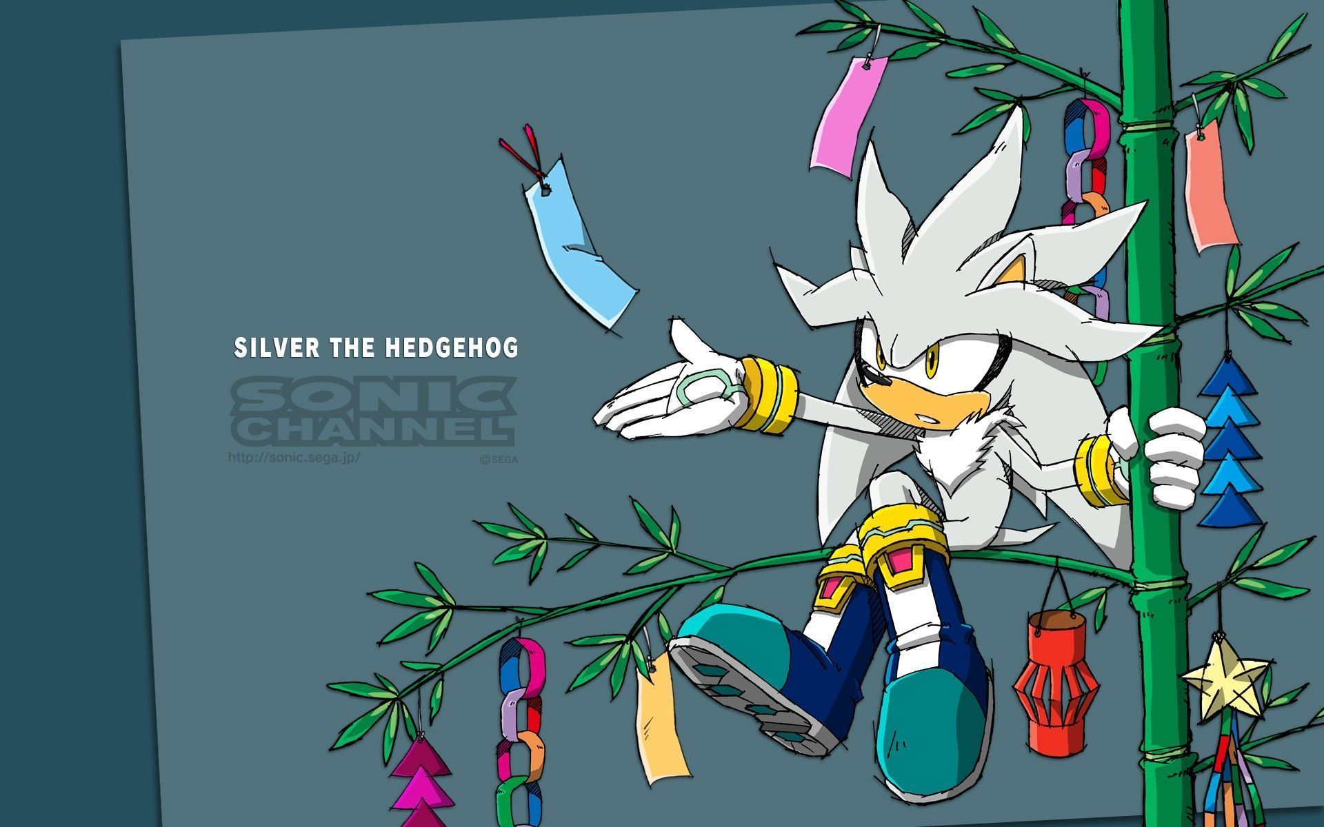 Sonic the hedgehog is sitting on a branch with some christmas decorations - Sonic