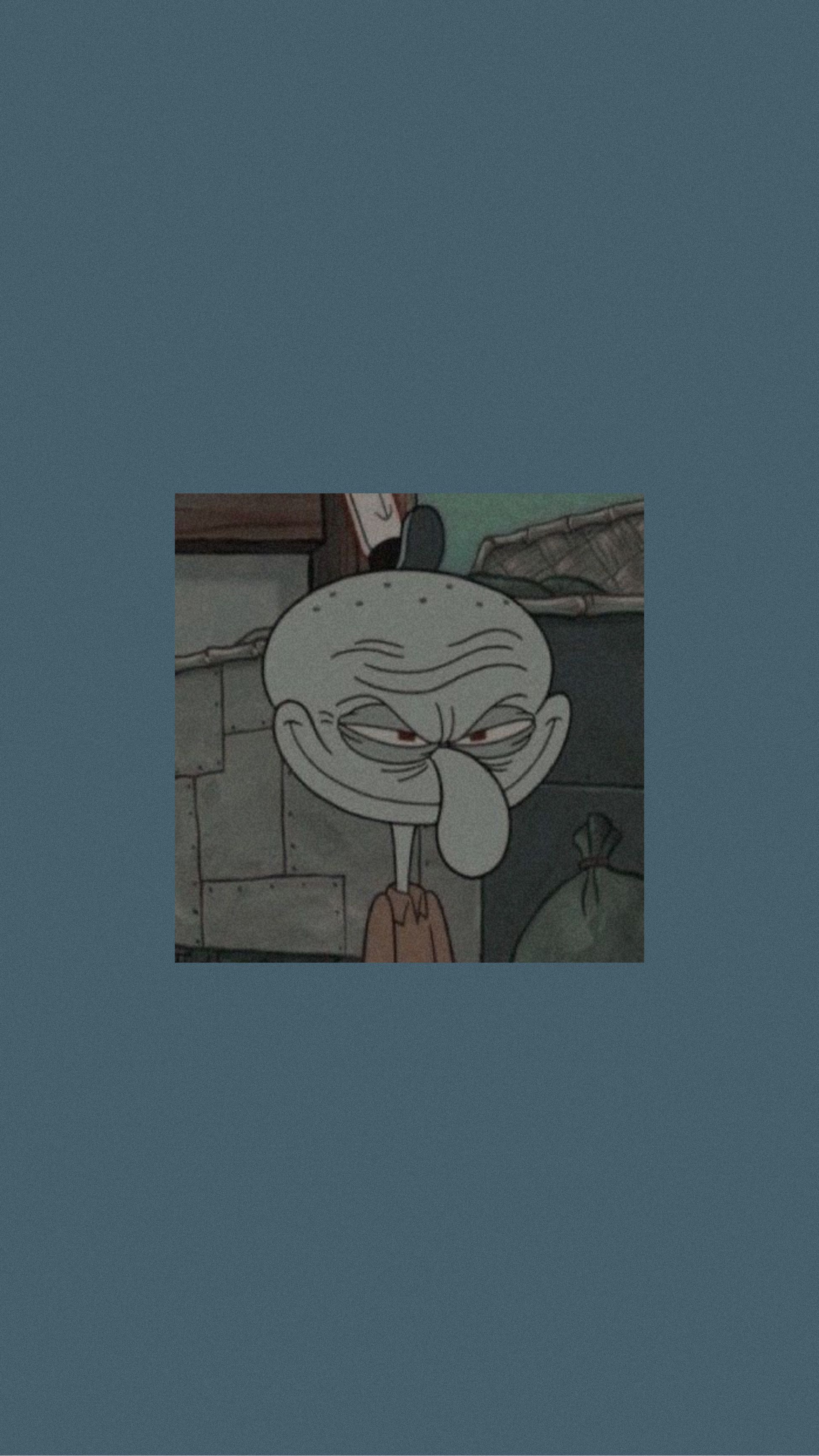 A cartoon character with an angry face - Squidward