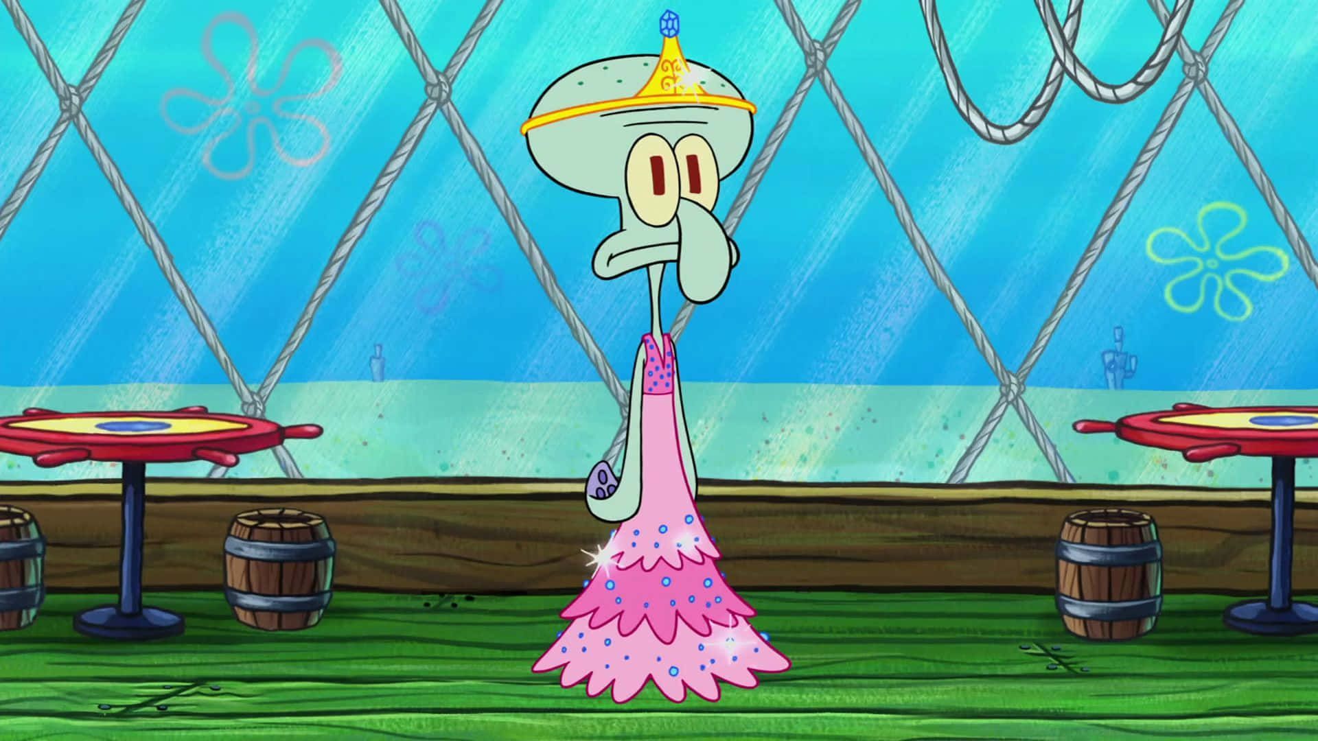 A cartoon image of a pink squid with a crown and a dress. - Squidward