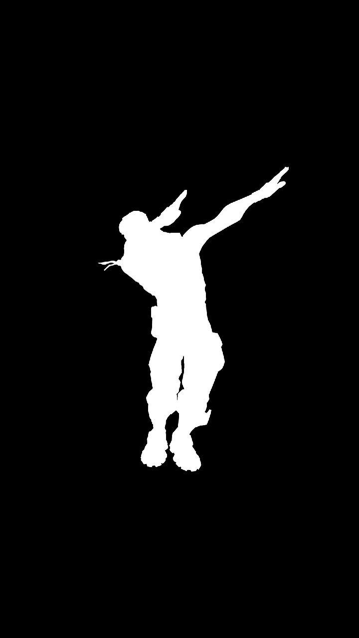 A silhouette of skateboarder in the air - Dab dance