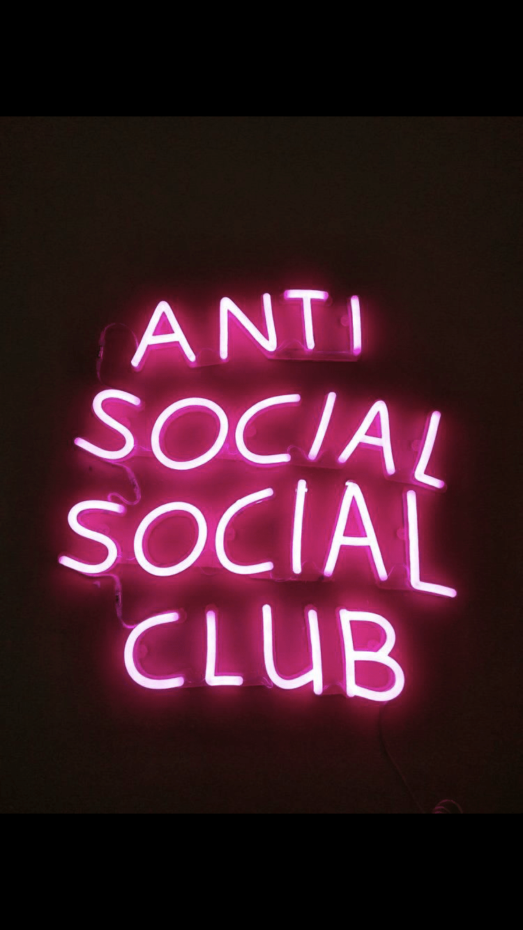 A pink neon sign that says 