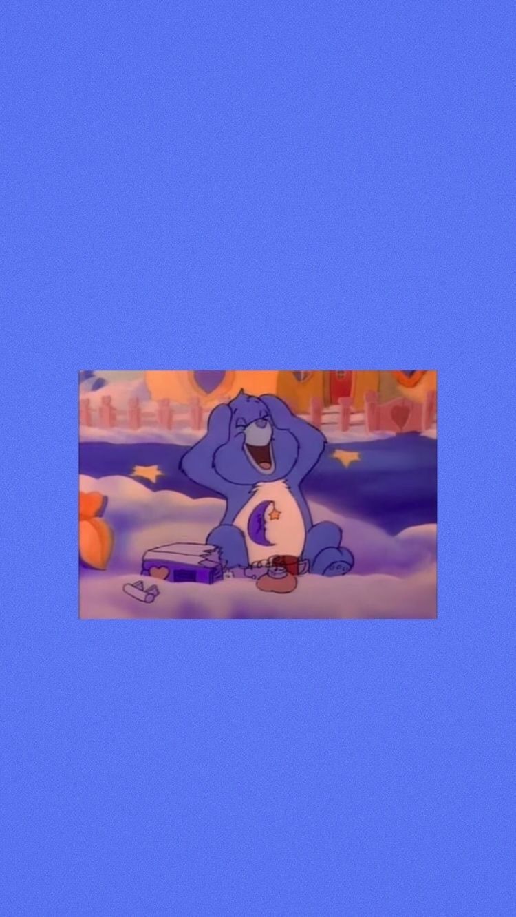 A blue bear with a purple moon on its paw is sitting on a cloud - Care Bears