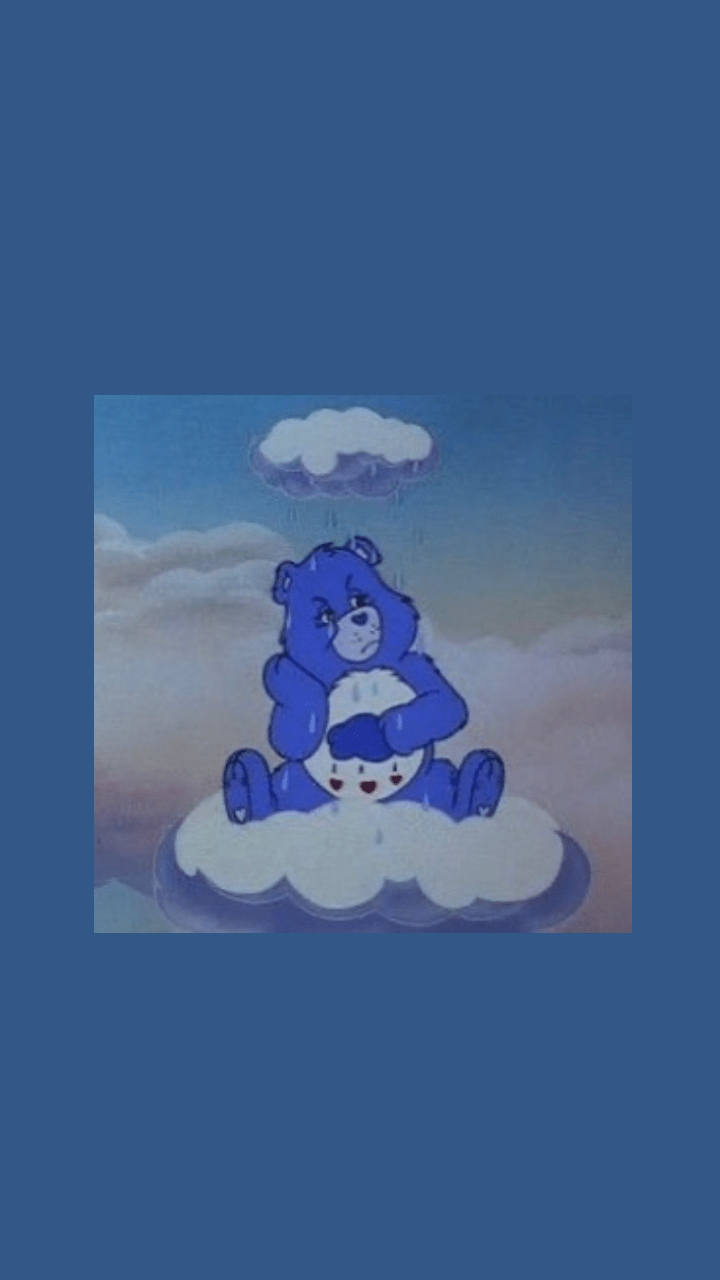 A blue bear sitting on a cloud - Care Bears