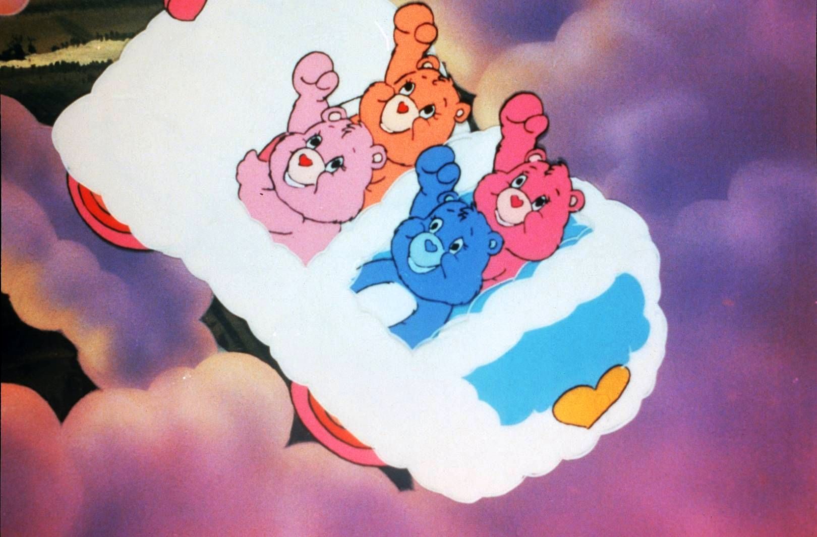 The Care Bears in a cloud bed, from the 1980s TV show. - Care Bears