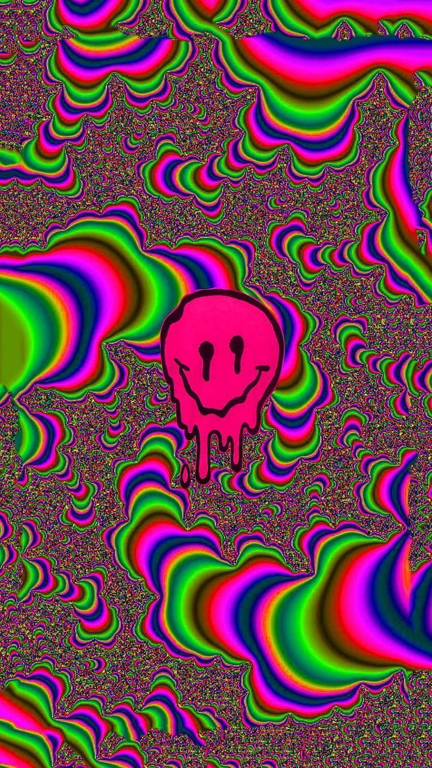 A neon pink smiley face with a keyhole for a nose is surrounded by a background of green, pink, and purple swirled lines. - Internetcore