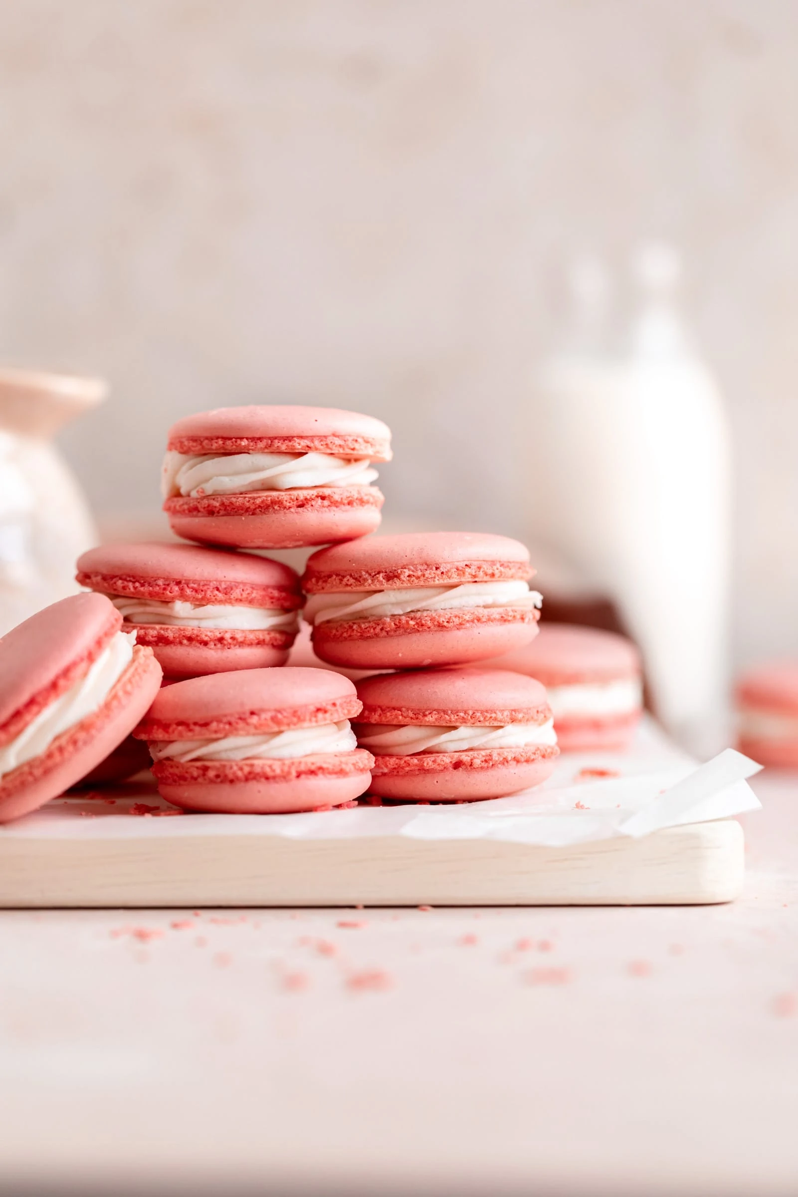 A stack of pink macarons on top - Bakery, macarons