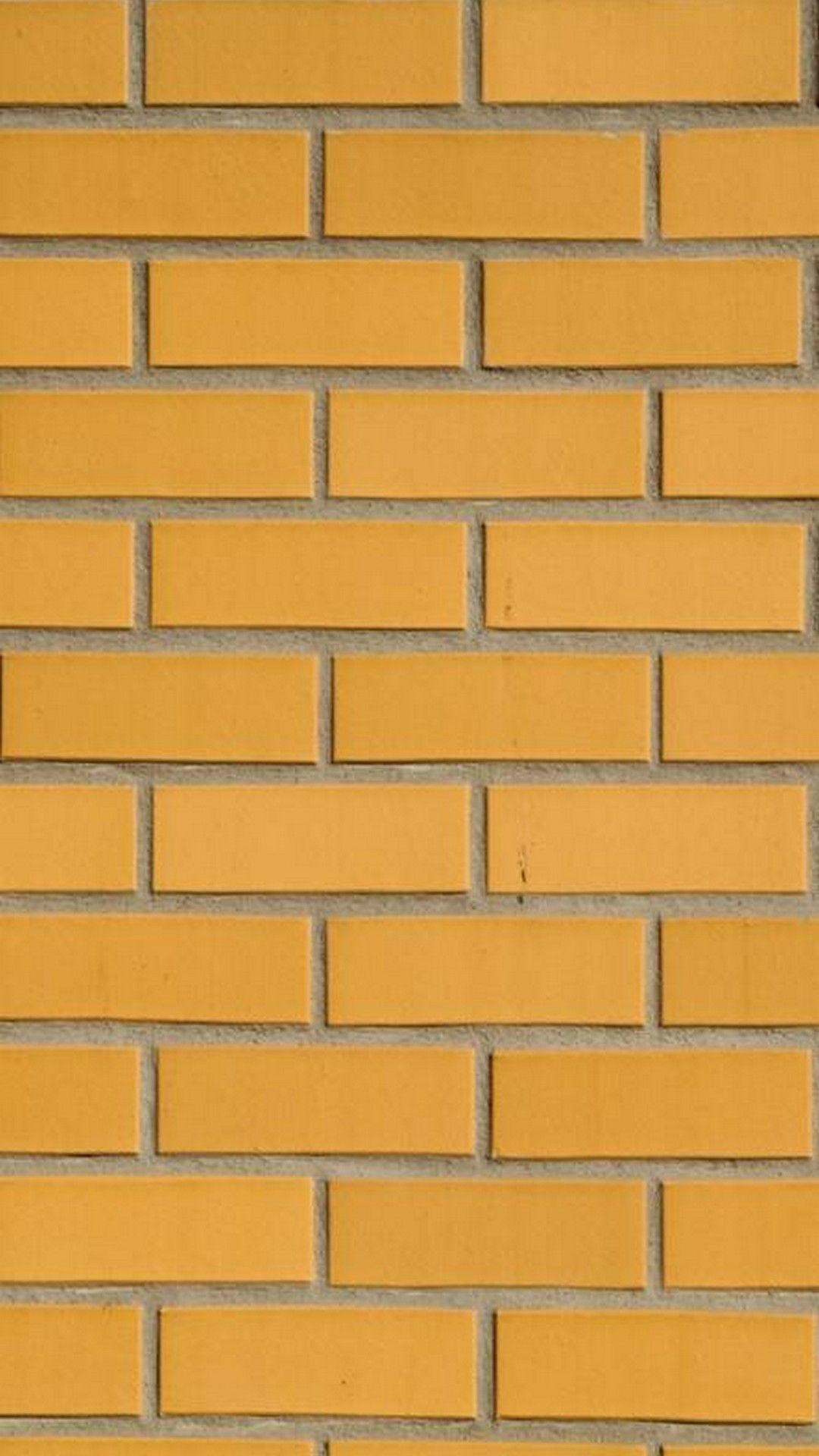 IPhone wallpaper with a yellow brick wall - Yellow