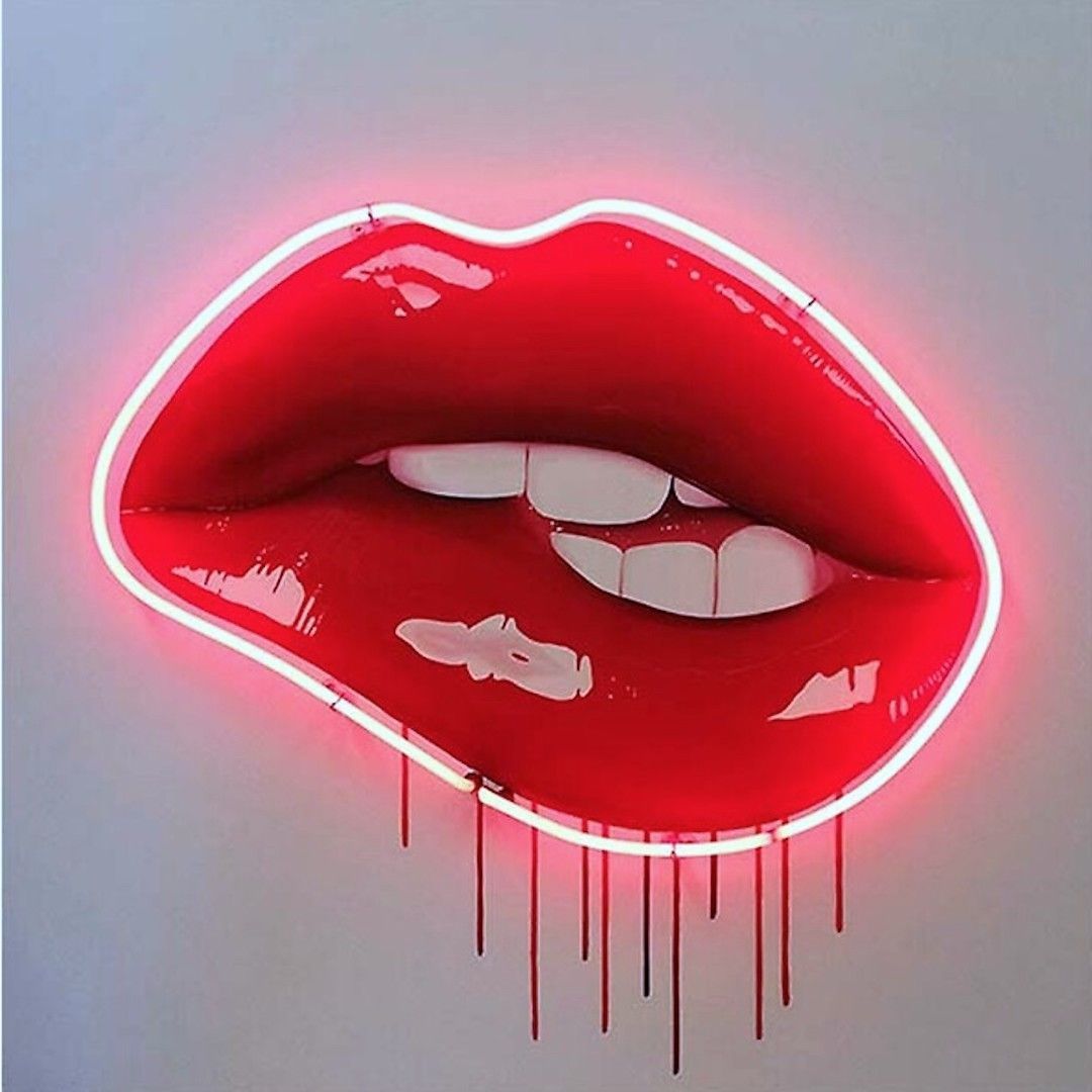 A neon sign of a pair of red lips with a white background - Lips