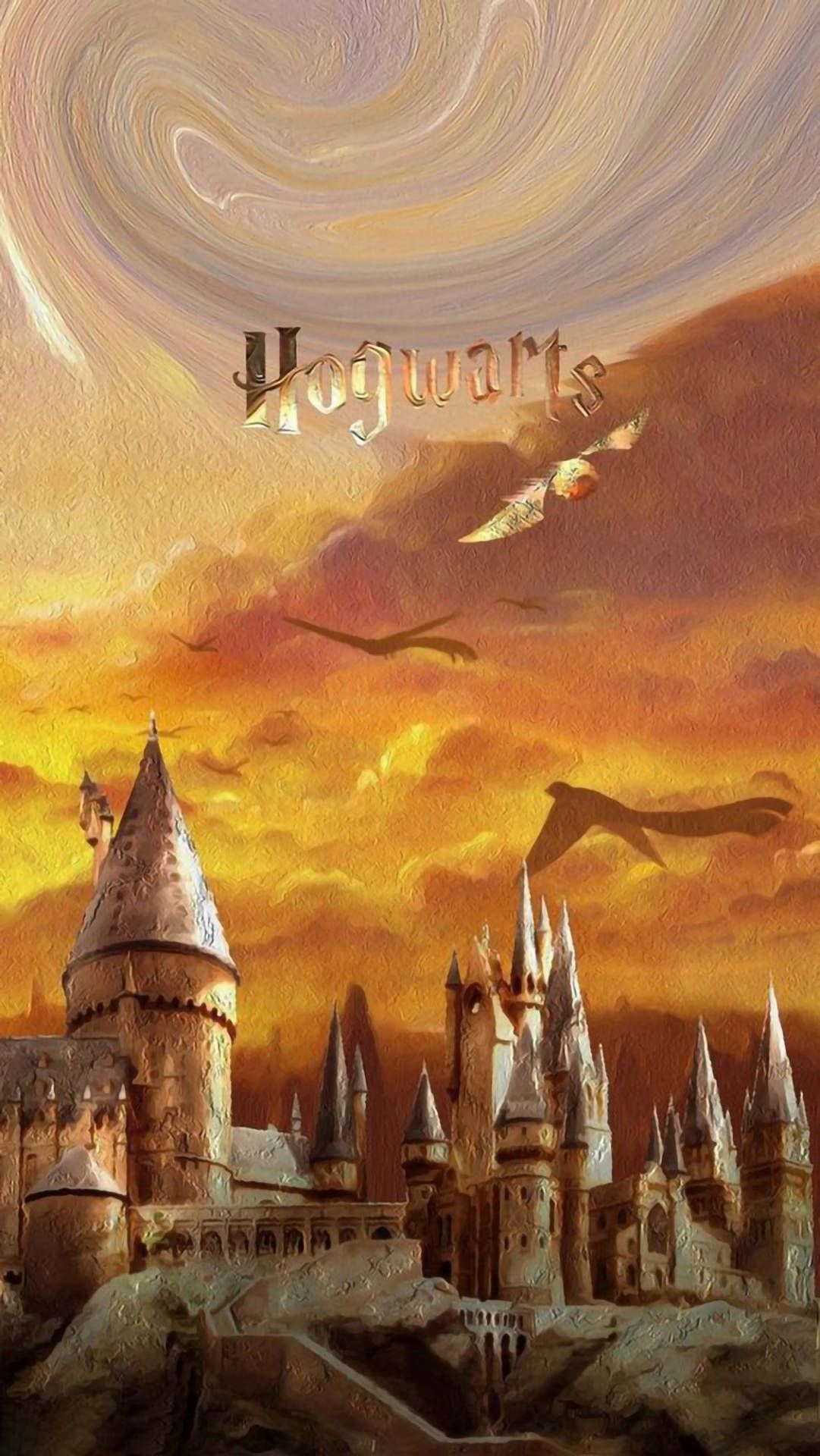 Hogwarts wallpaper with the sun setting behind the castle. - Hogwarts