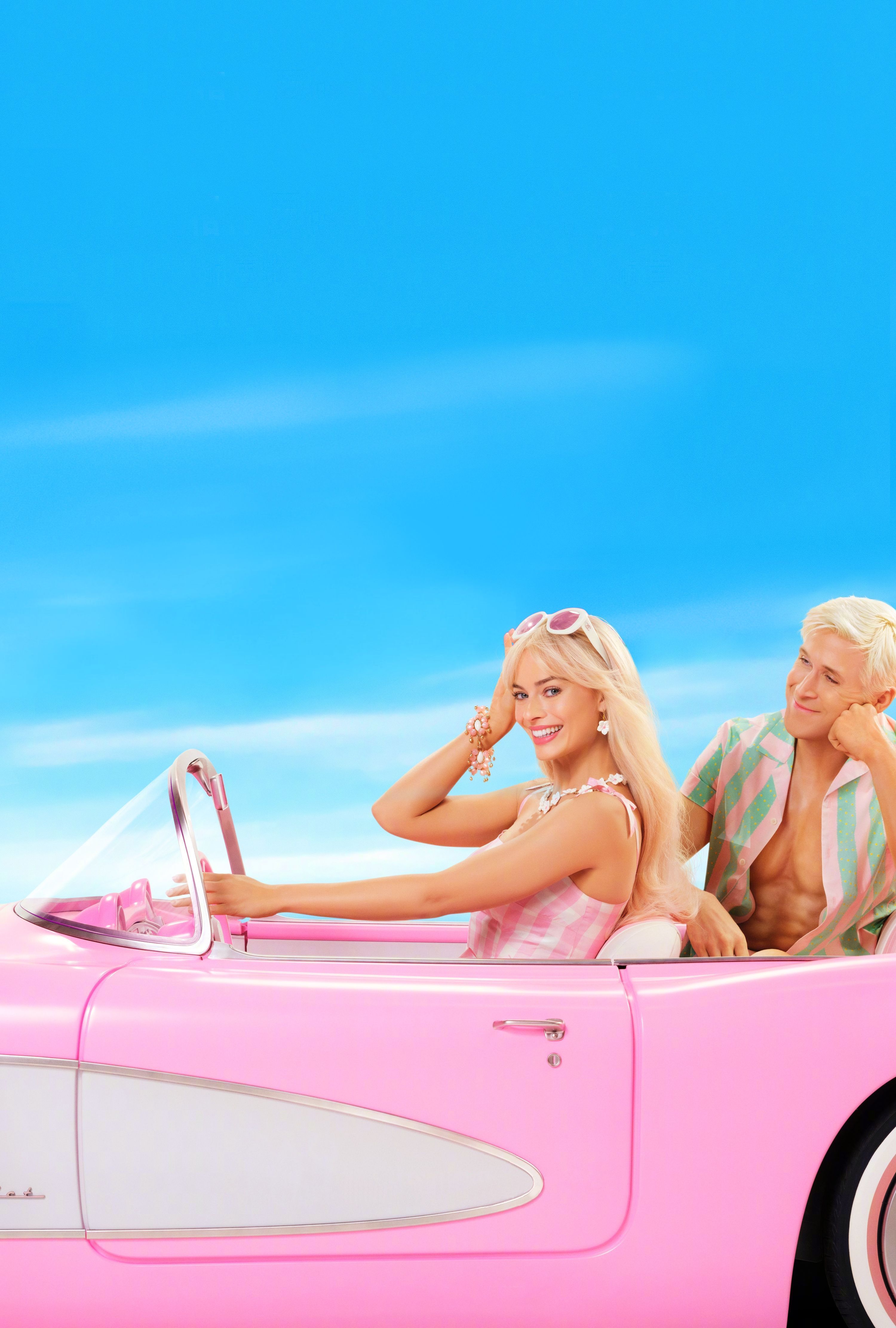 A man and woman in a pink car - Barbie