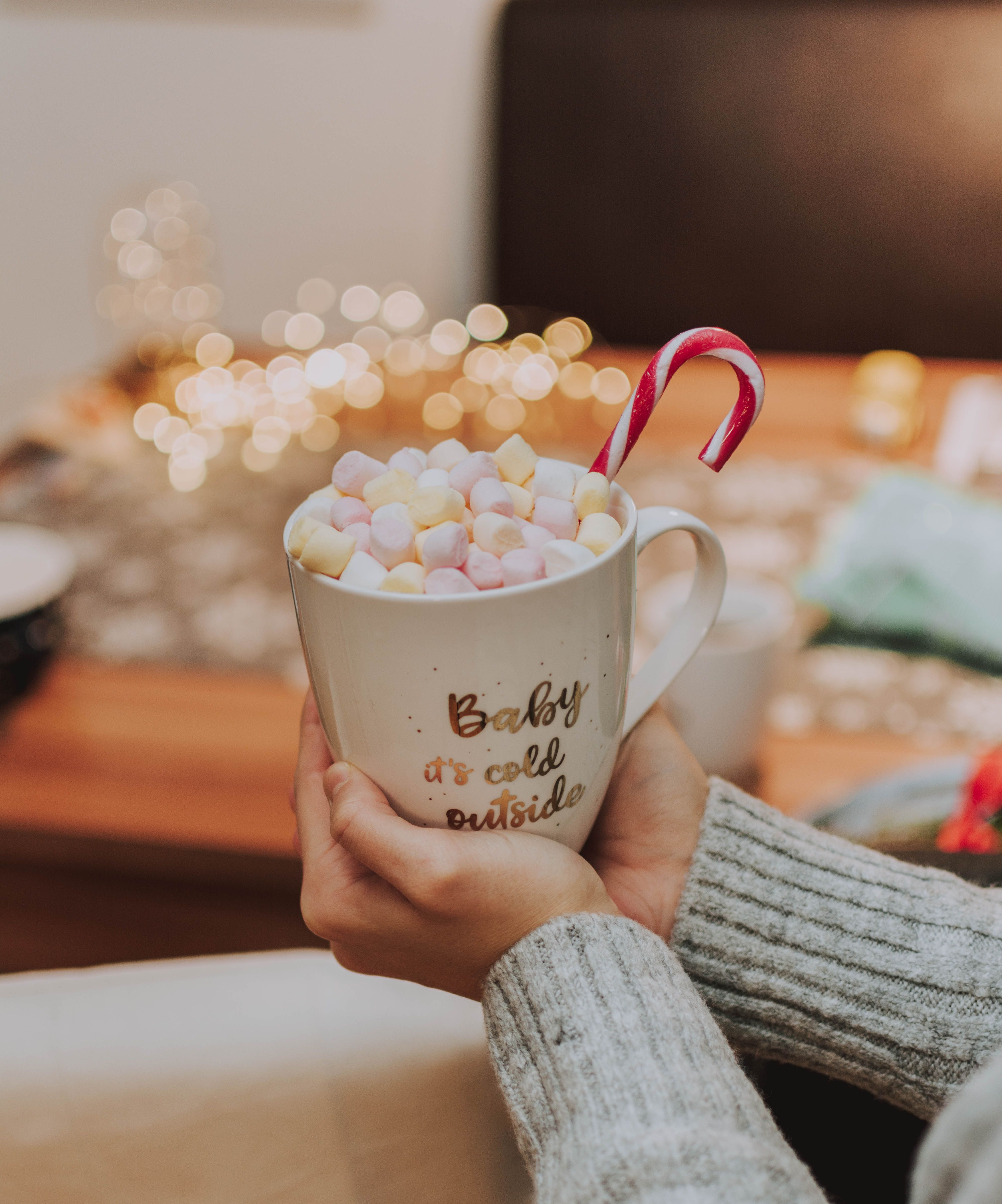 Download wallpaper 4000x4808 mug, inscription, marshmallows, candy cane, hands HD background