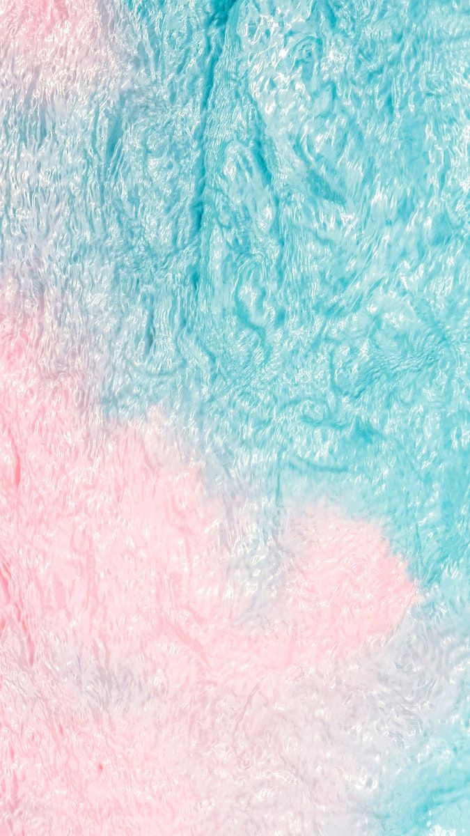 A close up of a fluffy pink and blue blanket - Candy