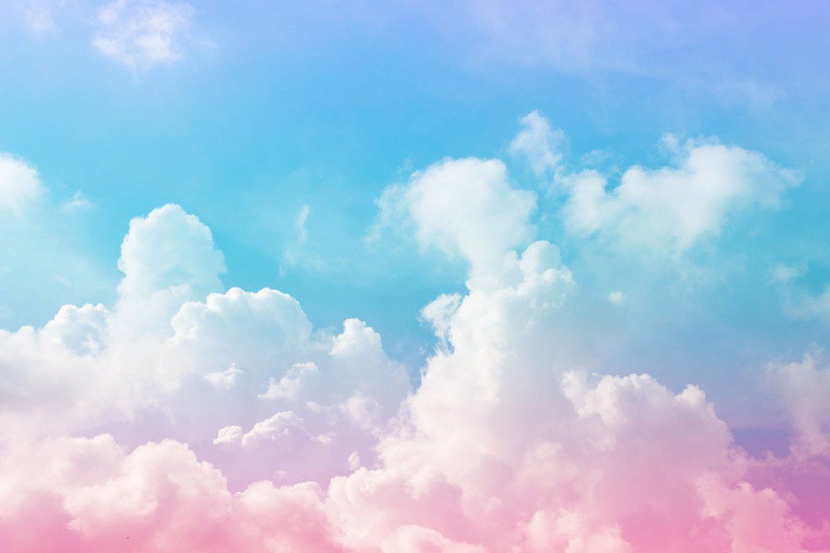 A sky with a pastel gradient of pink, blue, and purple, with fluffy white clouds. - Candy