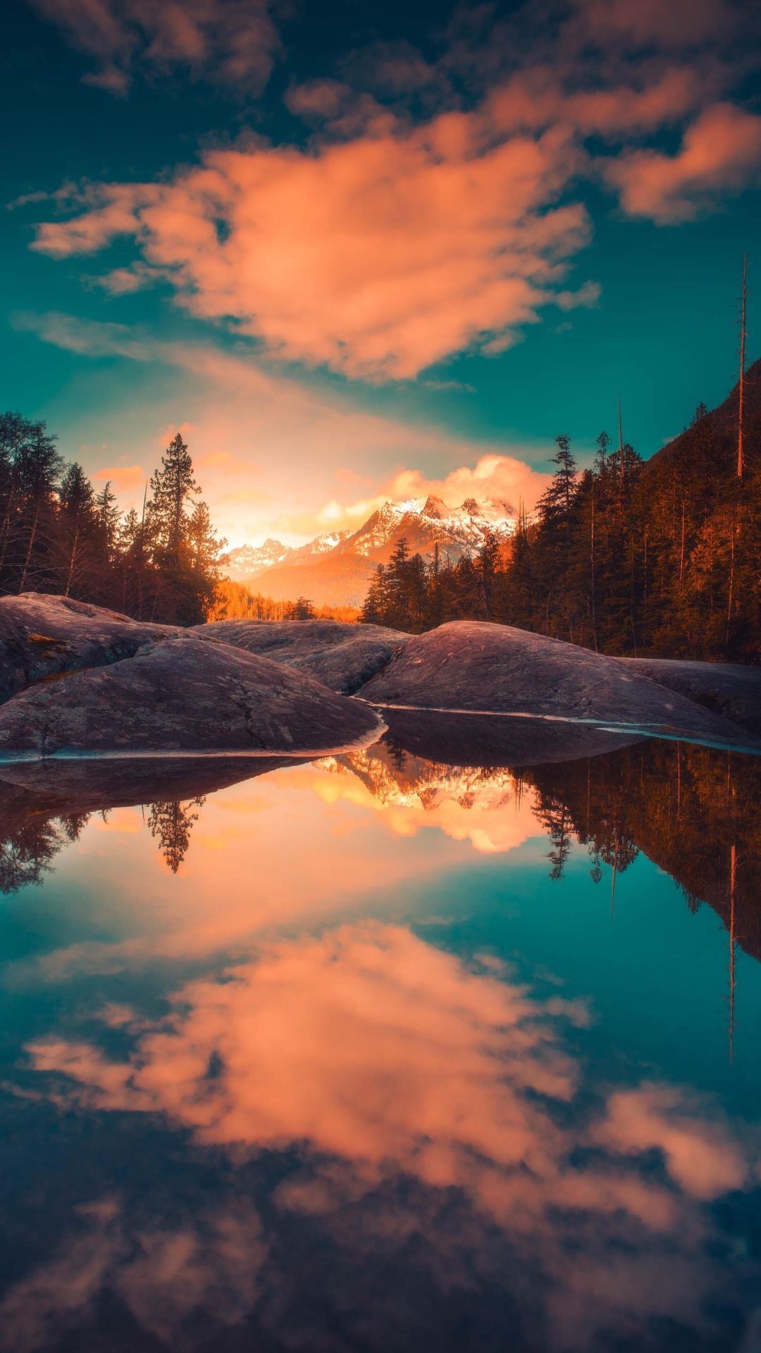 A lake with trees and mountains in the background - Beautiful, river, calming