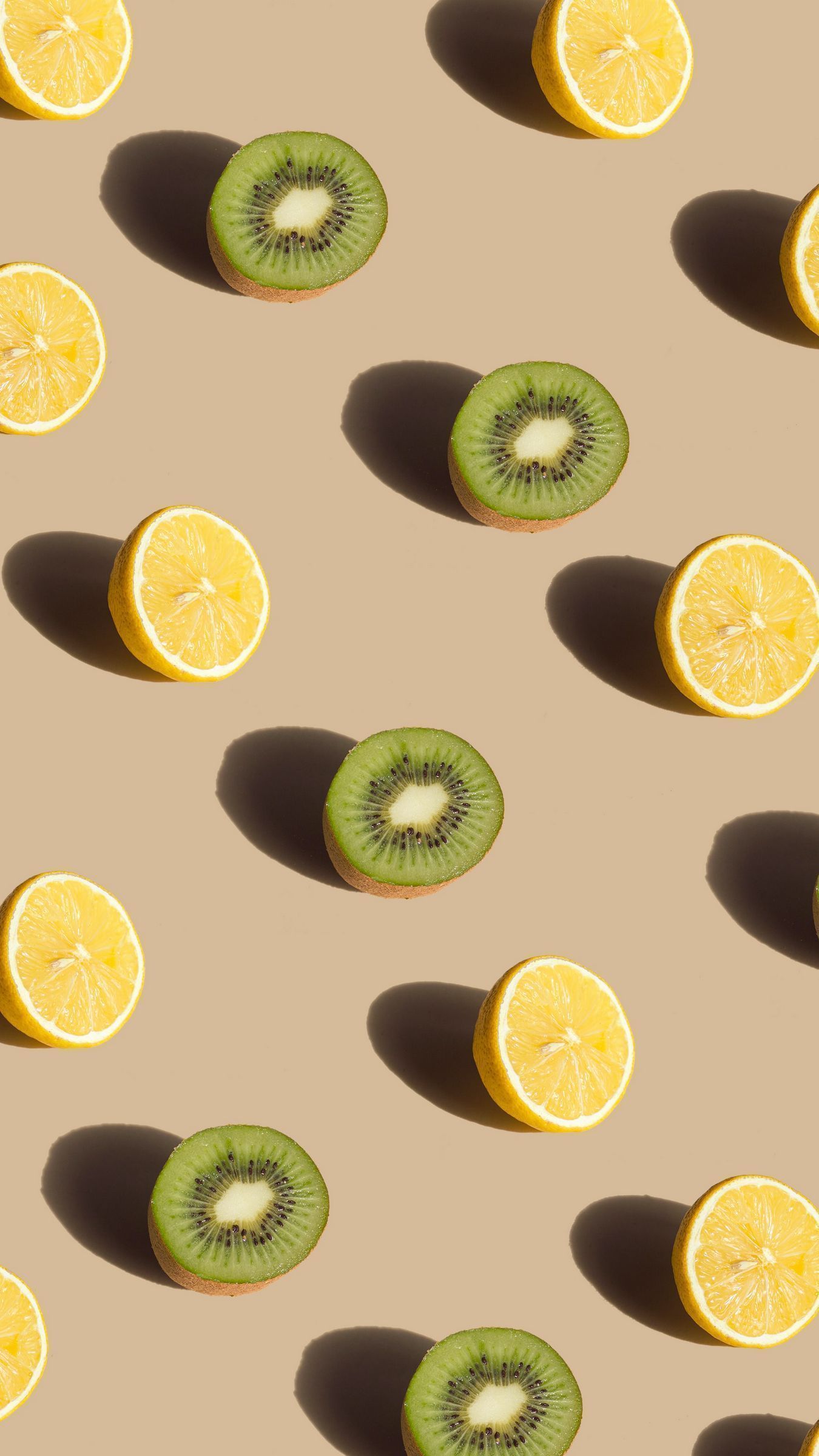 Download wallpaper 1350x2400 lemon, kiwi, fruit, pattern, green, yellow iphone 8+/7+/6s+/for parallax HD background