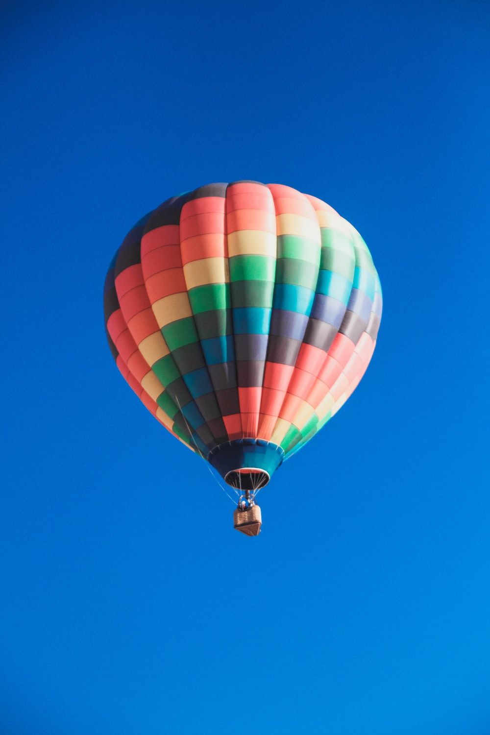 Worm's eye view photography of multicolored hot air balloon photo