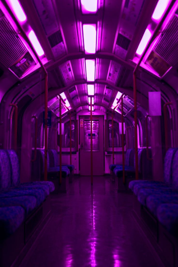 A train car lit up with purple lights - Dark vaporwave