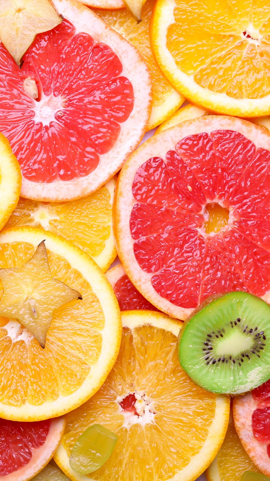 A close up of sliced fruit on top - Kiwi