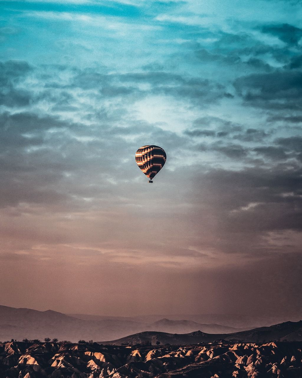 A hot air balloon floating in the sky - Hot air balloons