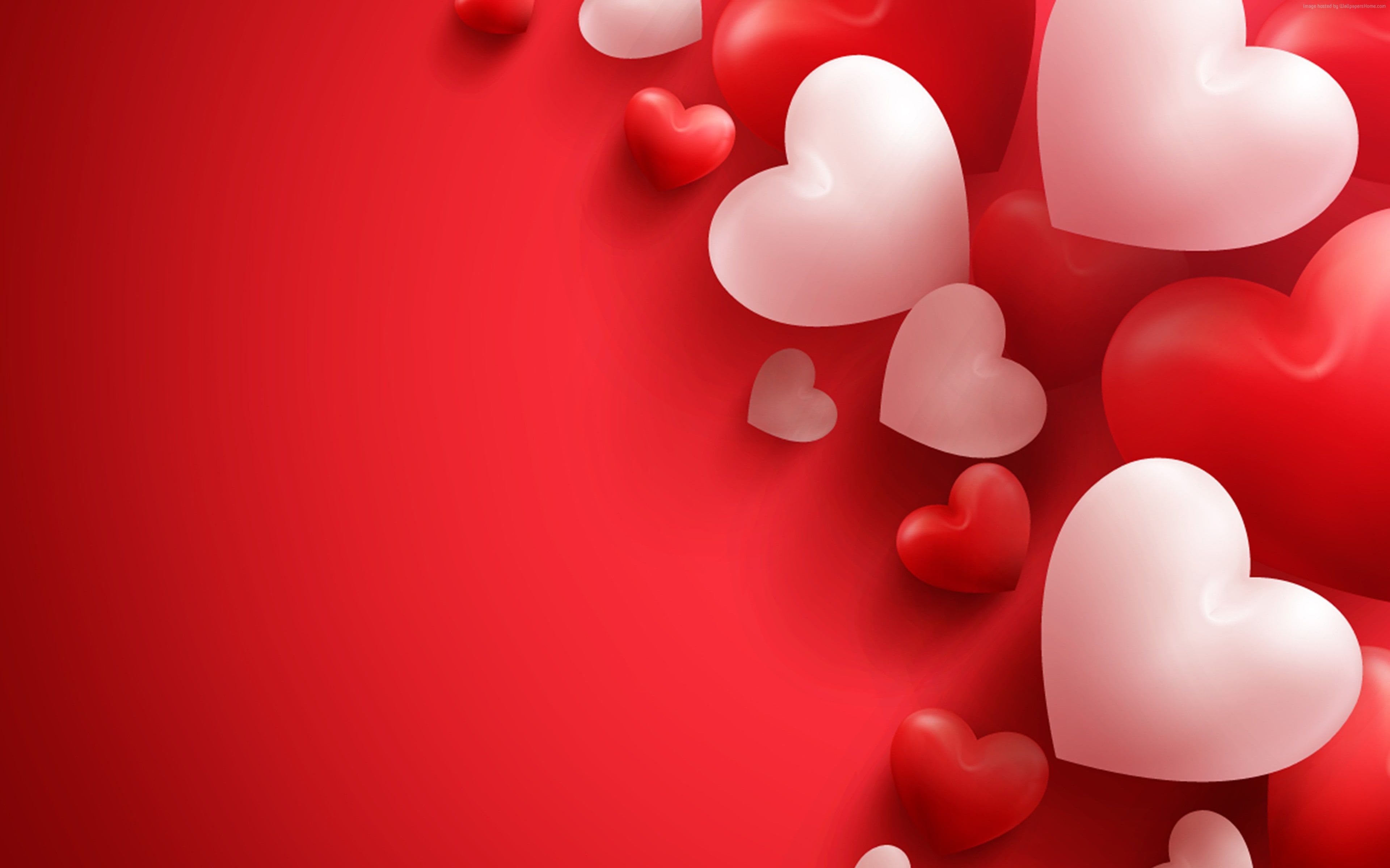 Red and white hearts floating on a red background - Valentine's Day