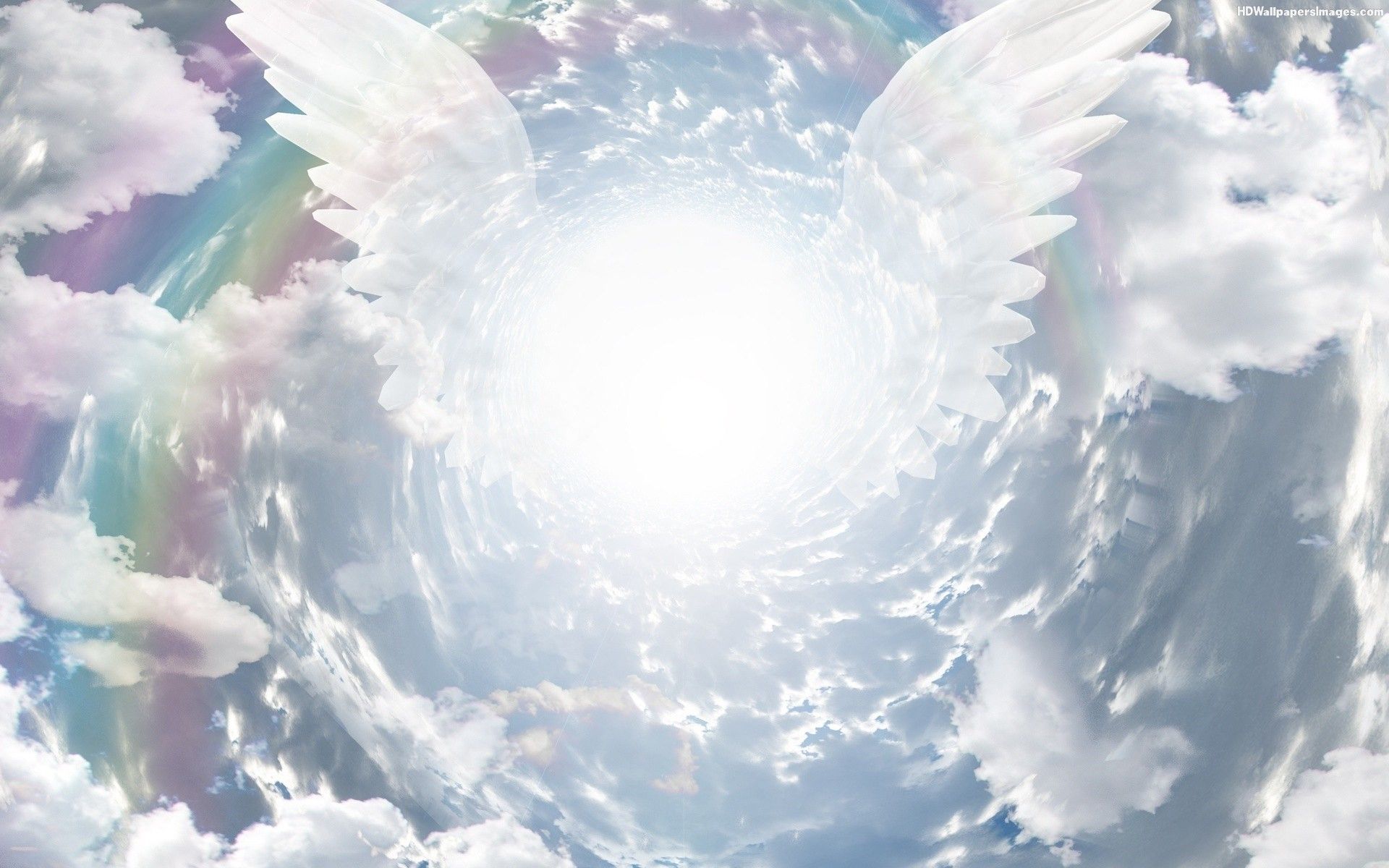 An angel's wings are spread open in the sky - Wings
