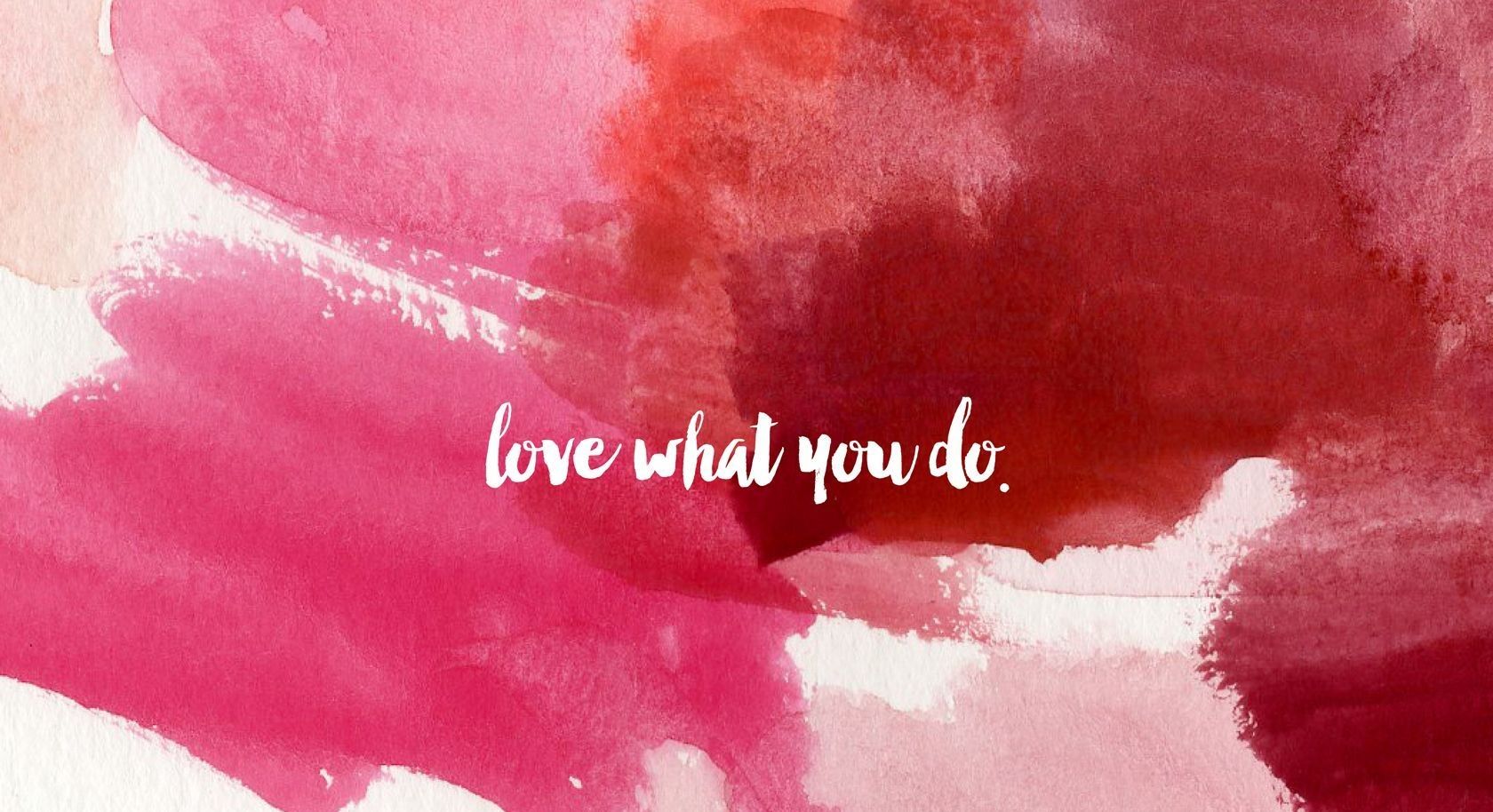 A pink and red watercolor background with the words love what you do - Love