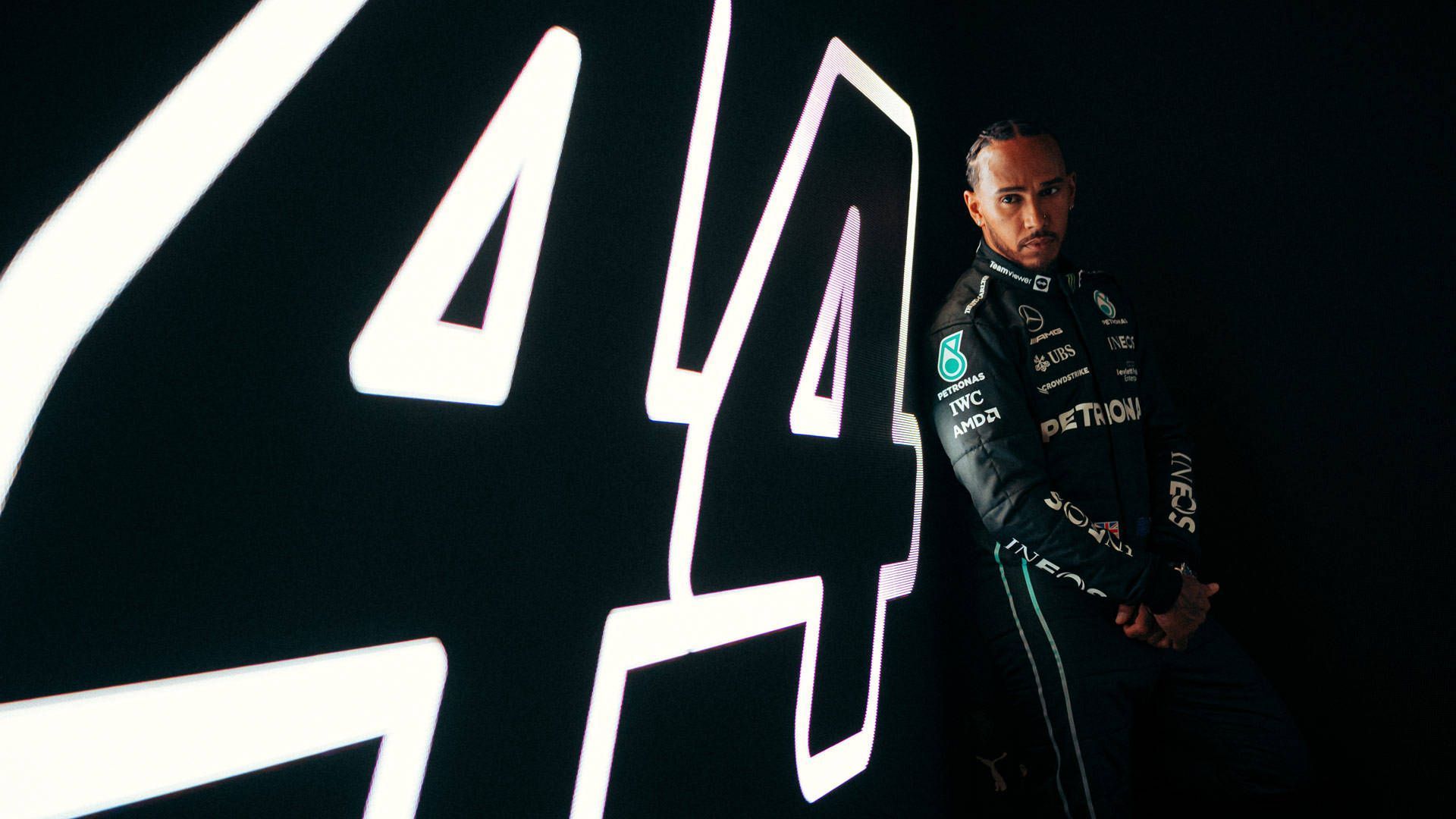 Mercedes' Lewis Hamilton poses for a photo next to the number 44, representing his 44 Formula One race victories, during a photo shoot in London, Tuesday, Feb. 11, 2020. - Lewis Hamilton