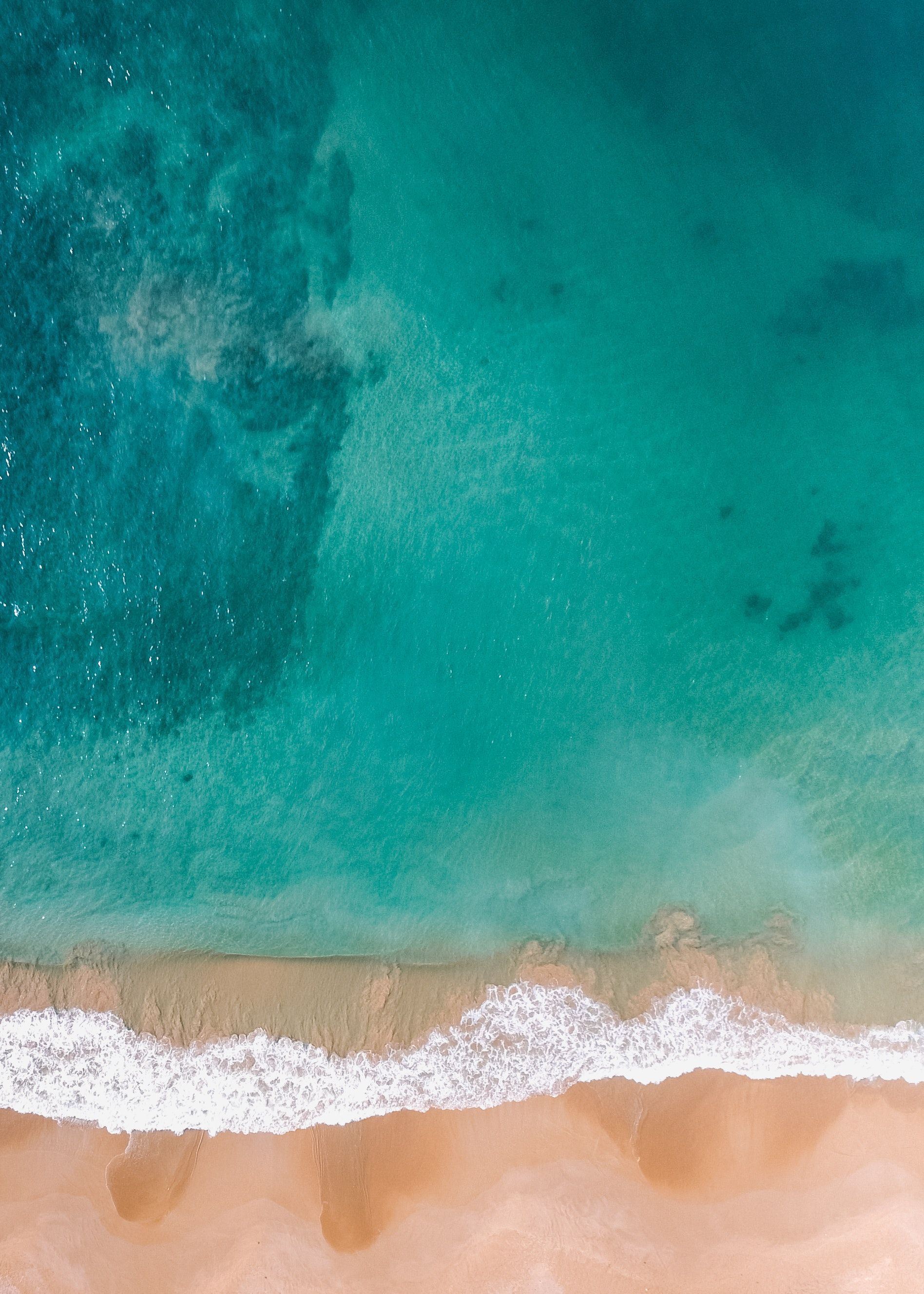 Aerial view of a sandy beach with crystal clear water - Beach, coast