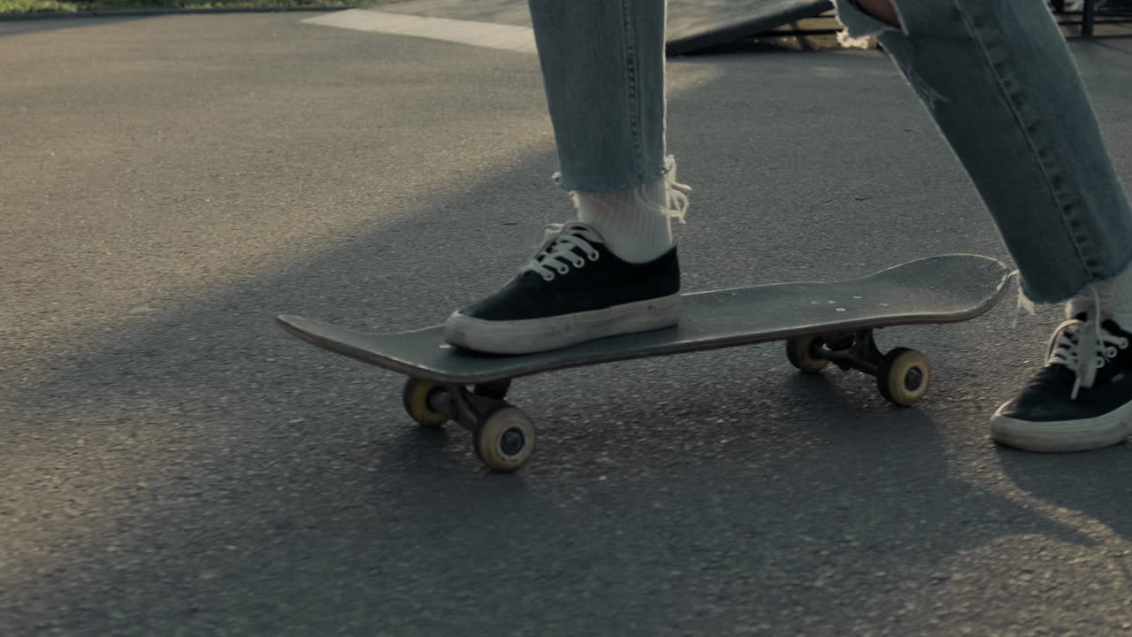 Close up of a person's feet on a skateboard - Skater