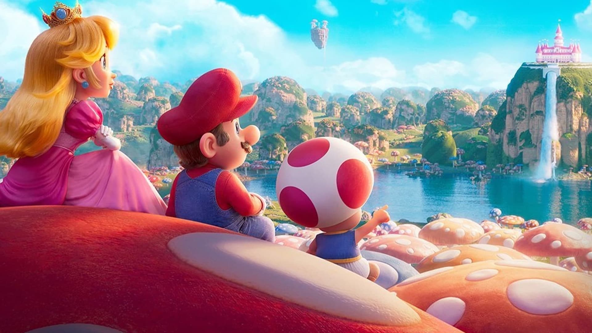 Princess Peach, Mario, and Toad look out over a mushroom-shaped kingdom in a scene from the Super Mario Bros. movie. - Super Mario