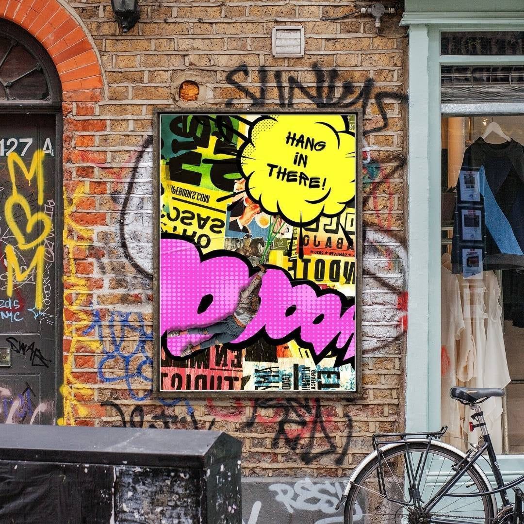 Graffiti on a brick wall with a framed poster that says 