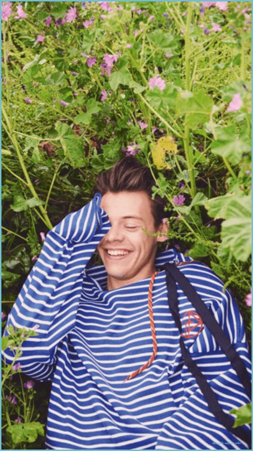 Harry Styles wears a striped shirt for the cover of British GQ. - Harry Styles