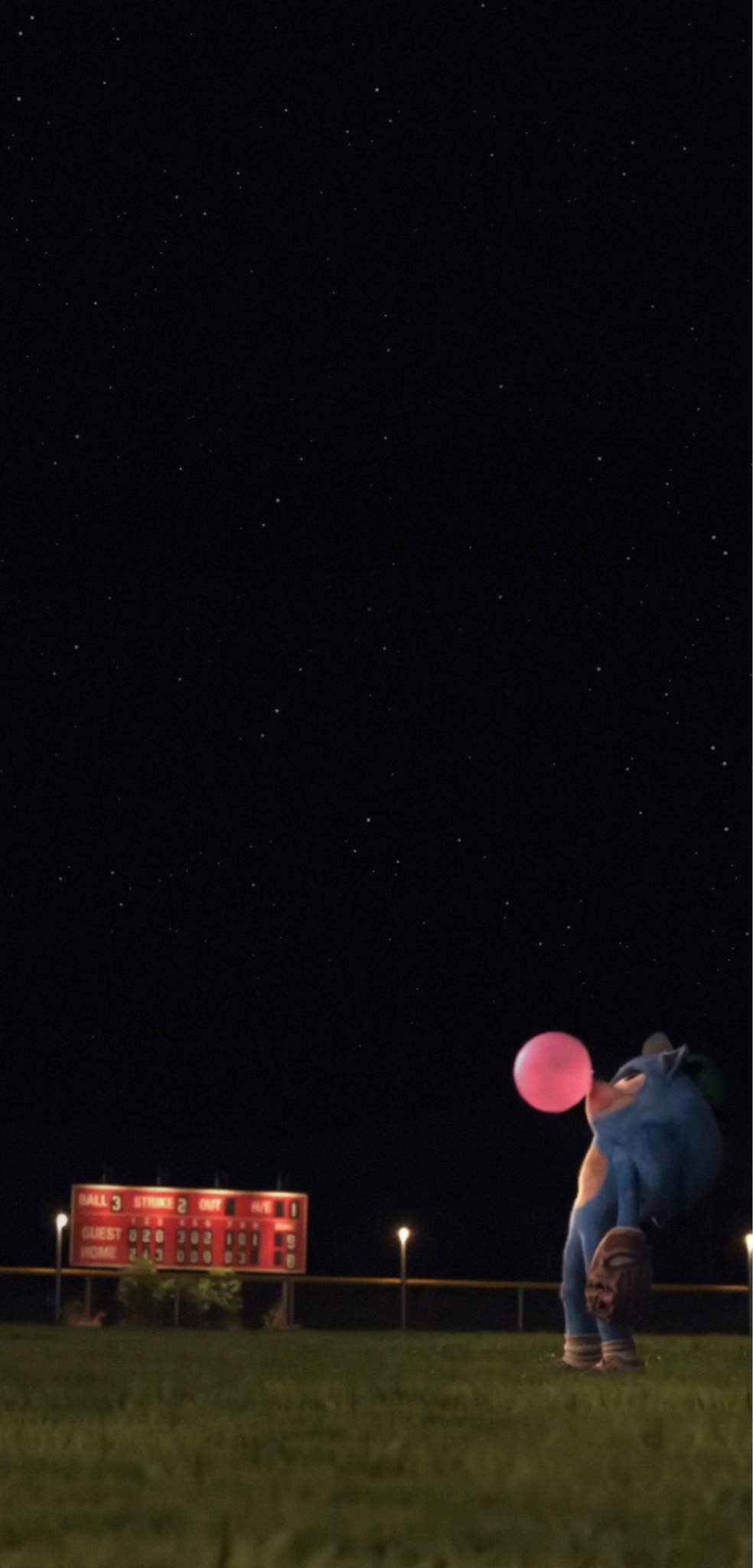 IPhone wallpaper of a man with a red balloon in the night sky - Sonic