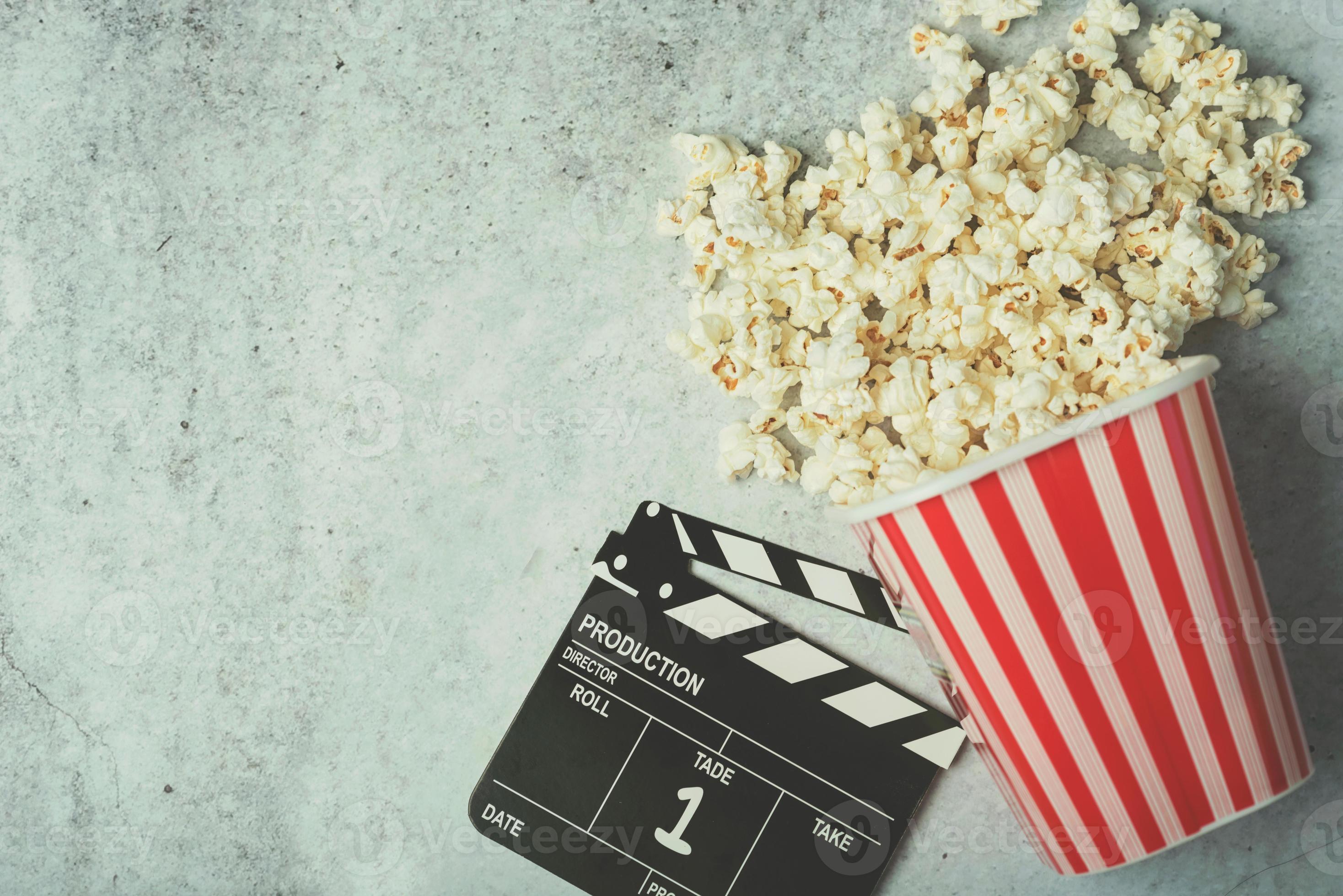 Cinema movie concept, popcorn and clapperboard