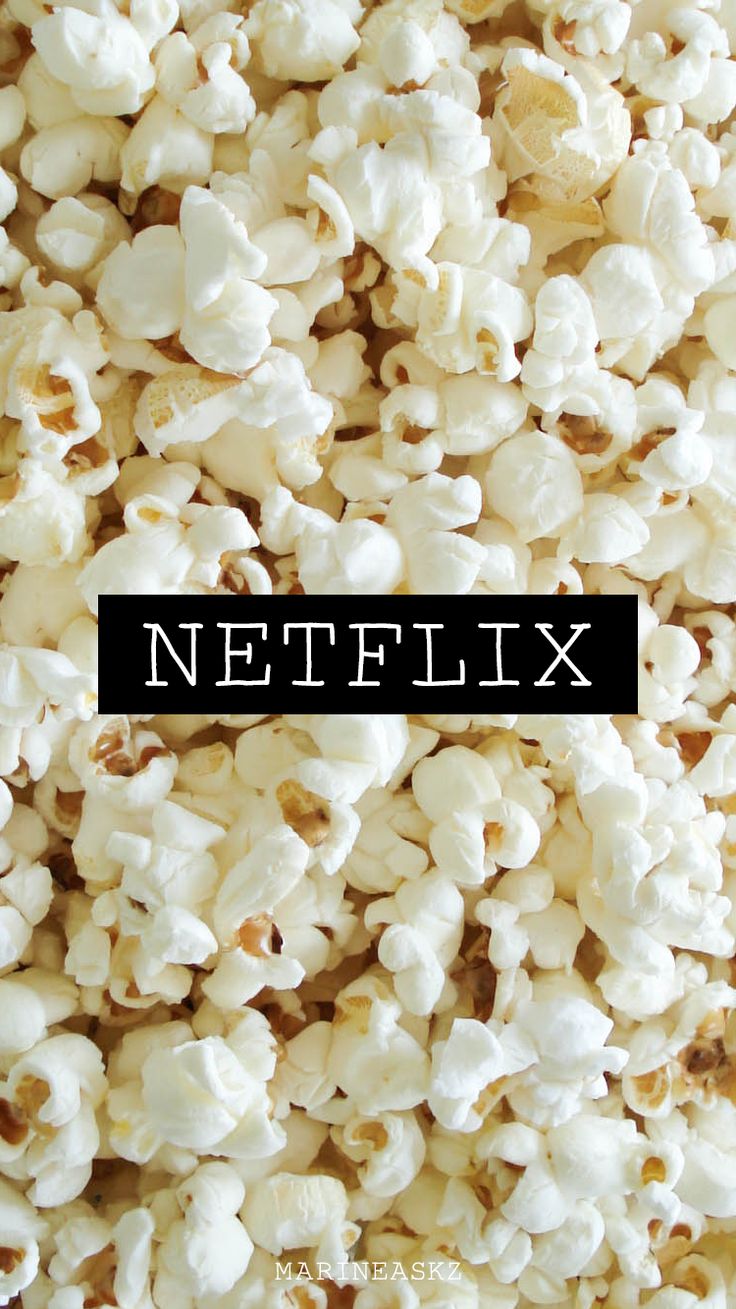 A Netflix logo on top of a pile of popcorn. - Popcorn