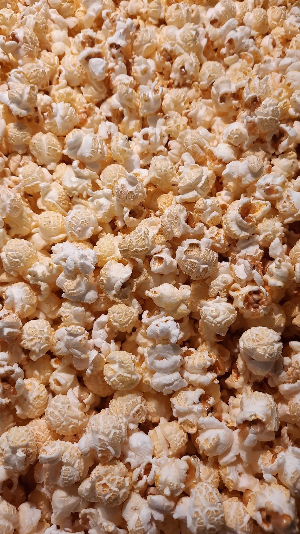 A pile of popcorn with white topping - Popcorn