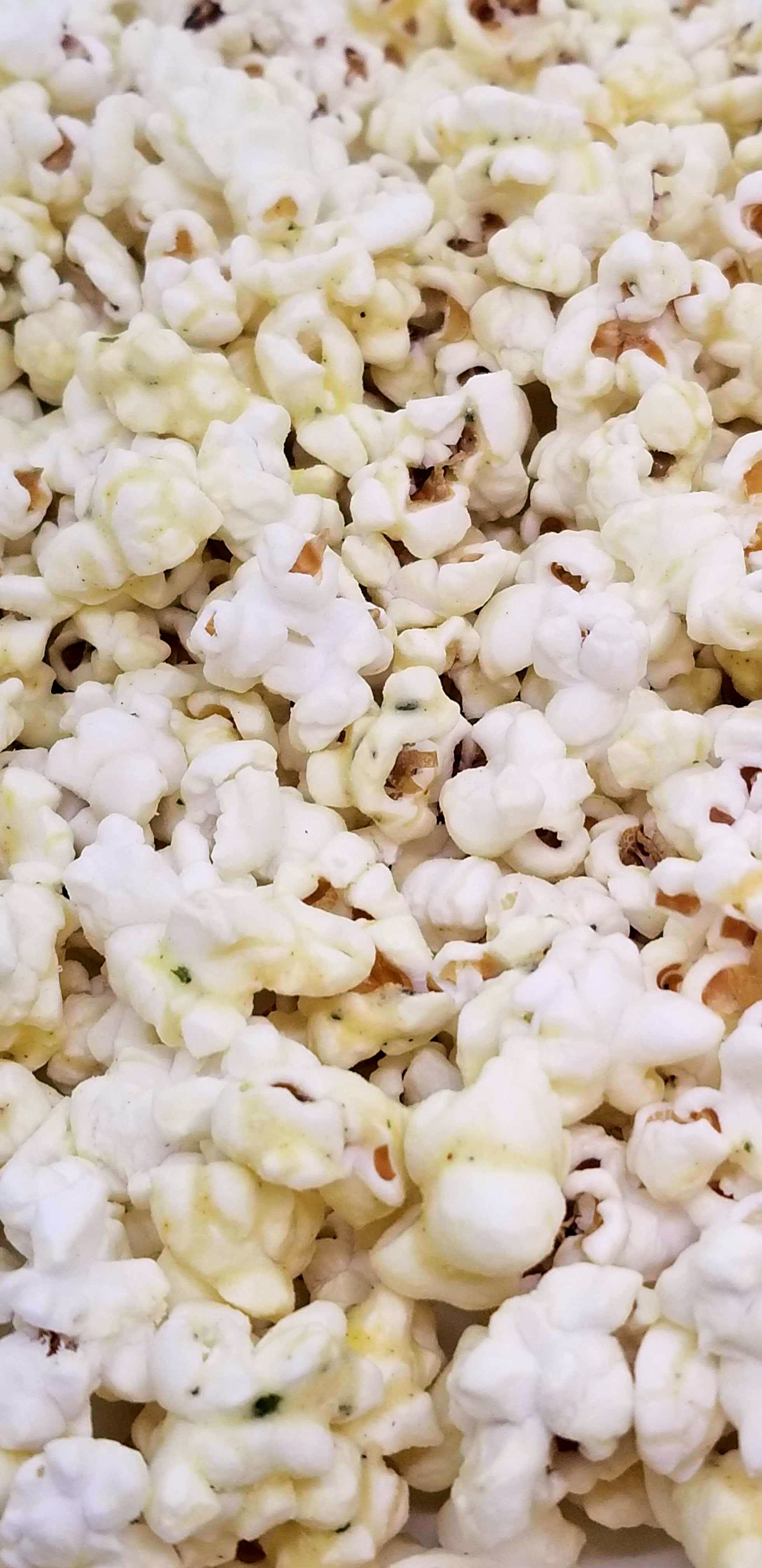 A close up of a pile of popcorn - Popcorn